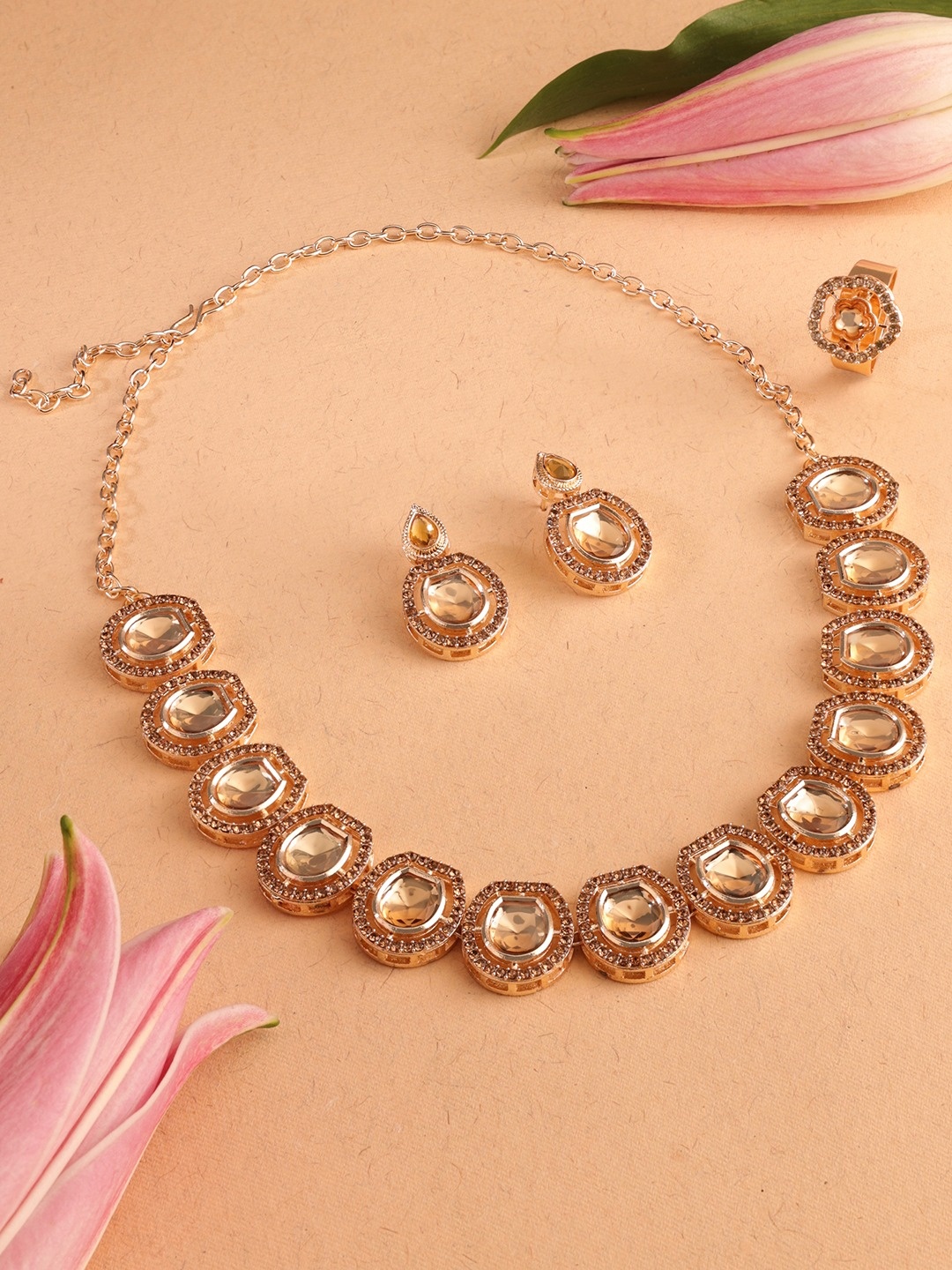 Zaveri Pearls Gold Plated Artificial Stones-Studded Necklace And Earrings With Finger Ring
Zaveri Pearls Gold Plated Artificial Stones-Studded Necklace And Earrings With Finger Ring
