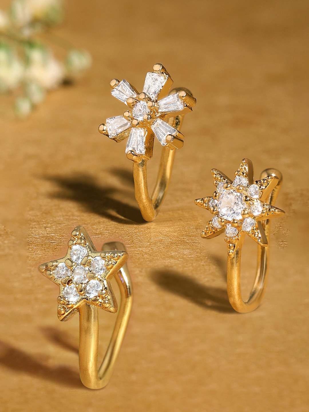 Zaveri Pearls Set Of 3 Cubic Zirconia Stone-Studded Clip On Nose Pins, Gold
Zaveri Pearls Set Of 3 Cubic Zirconia Stone-Studded Clip On Nose Pins, Gold
