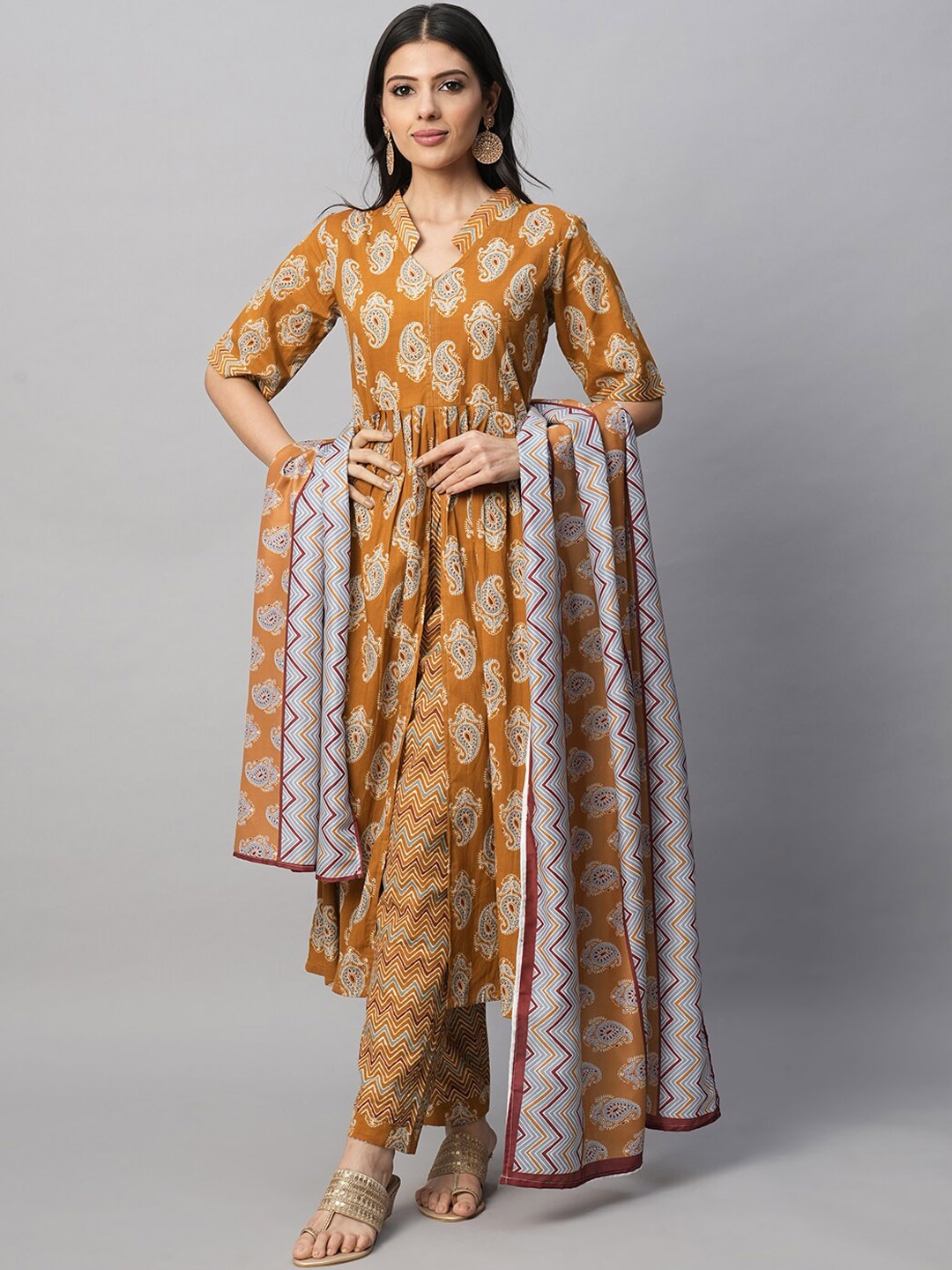 DIVASTRI Ethnic Motifs Printed Notch Neck Anarkali Kurta With Trouser & Dupatta, Mustard
DIVASTRI Ethnic Motifs Printed Notch Neck Anarkali Kurta With Trouser & Dupatta, Mustard