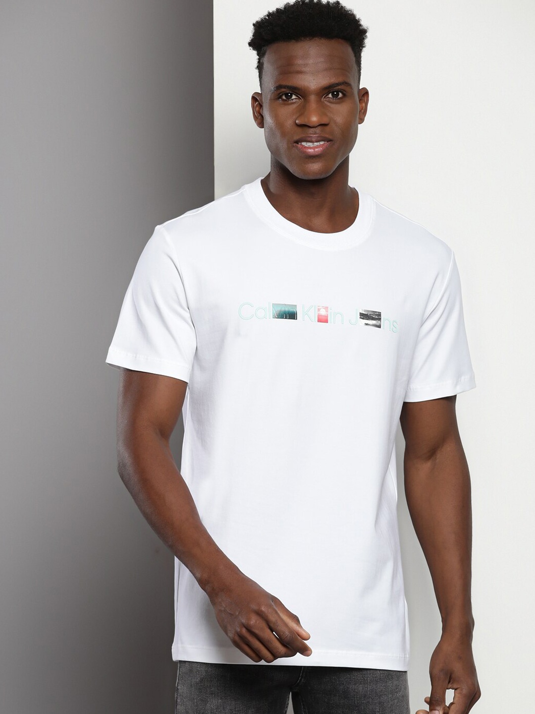 Calvin Klein Jeans Brand Logo Printed Cotton Round Neck Applique Casual T-shirt, White
Calvin Klein Jeans Brand Logo Printed Cotton Round Neck Applique Casual T-shirt, White