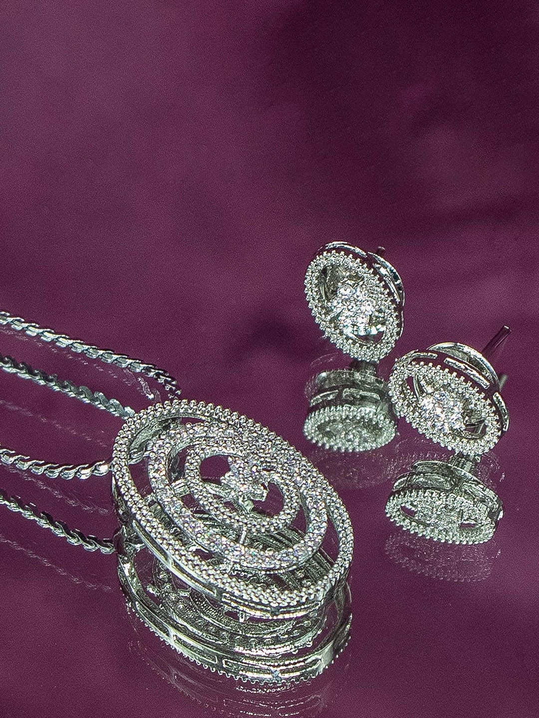 Manikya Rhodium-Plated American Diamond-Stones Studded Flower Shaped Pendant And Earrings, Silver
Manikya Rhodium-Plated American Diamond-Stones Studded Flower Shaped Pendant And Earrings, Silver