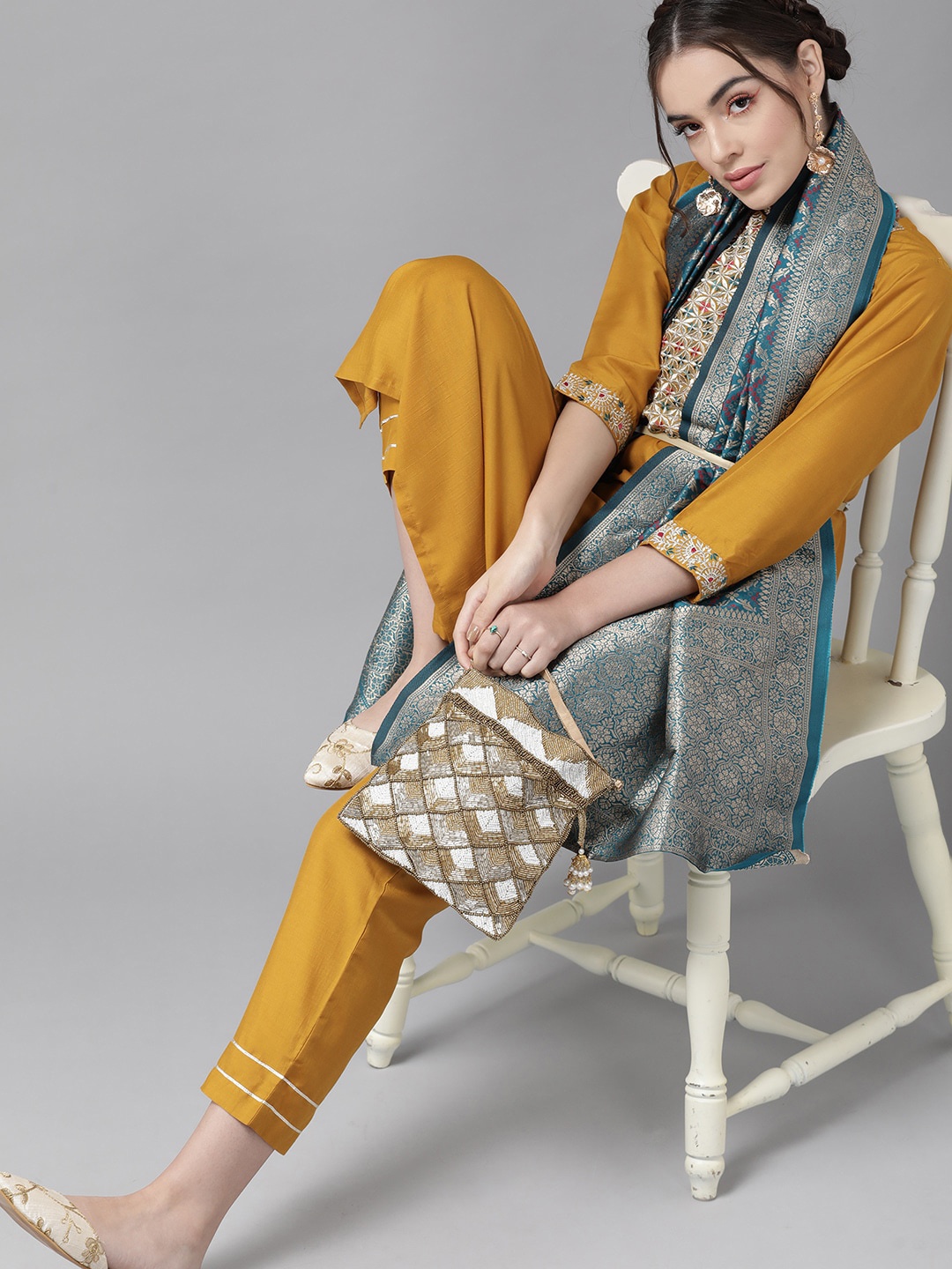KALINI Ethnic Motifs Yoke Design Regular Thread Work Kurta With Trousers & Dupatta, Mustard
KALINI Ethnic Motifs Yoke Design Regular Thread Work Kurta With Trousers & Dupatta, Mustard