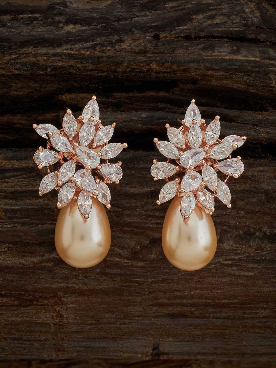 Kushal's Fashion Jewellery Gold-Plated Cubic Zirconia Studded Teardrop Shaped Drop Earrings
Kushal's Fashion Jewellery Gold-Plated Cubic Zirconia Studded Teardrop Shaped Drop Earrings