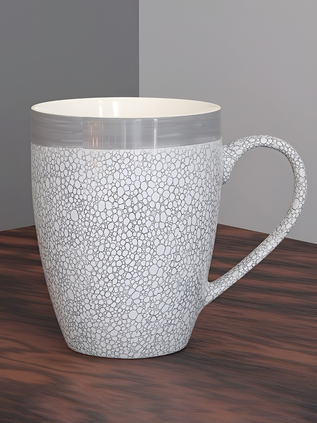 The Earth Store Grey & White Printed Microwave Safe Ceramic Glossy Finish Mug 280 ml
The Earth Store Grey & White Printed Microwave Safe Ceramic Glossy Finish Mug 280 ml