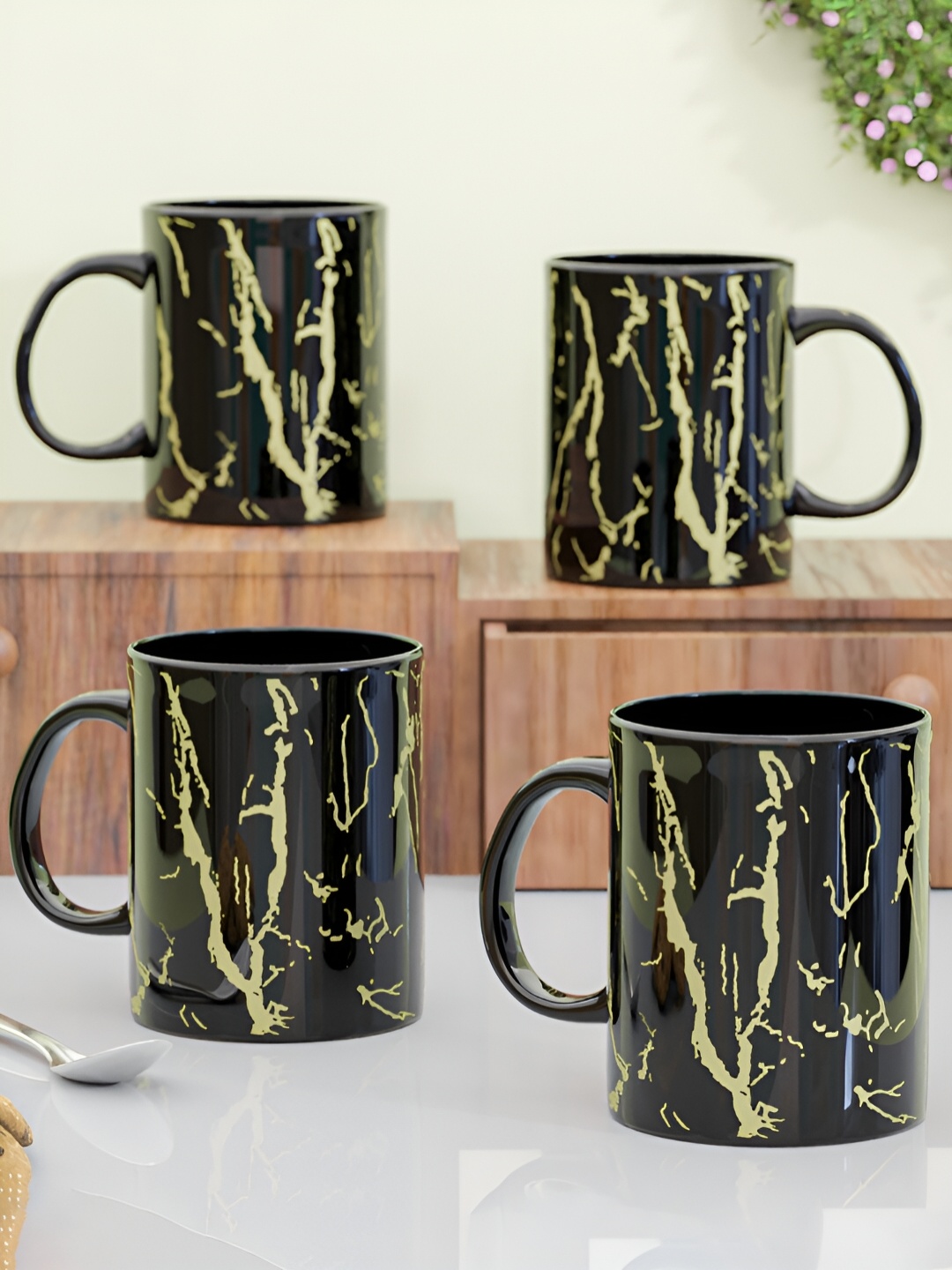 The Earth Store Black 4 Pcs Printed Microwave Safe Glossy Finish Ceramic Mug 370 ml Each
The Earth Store Black 4 Pcs Printed Microwave Safe Glossy Finish Ceramic Mug 370 ml Each