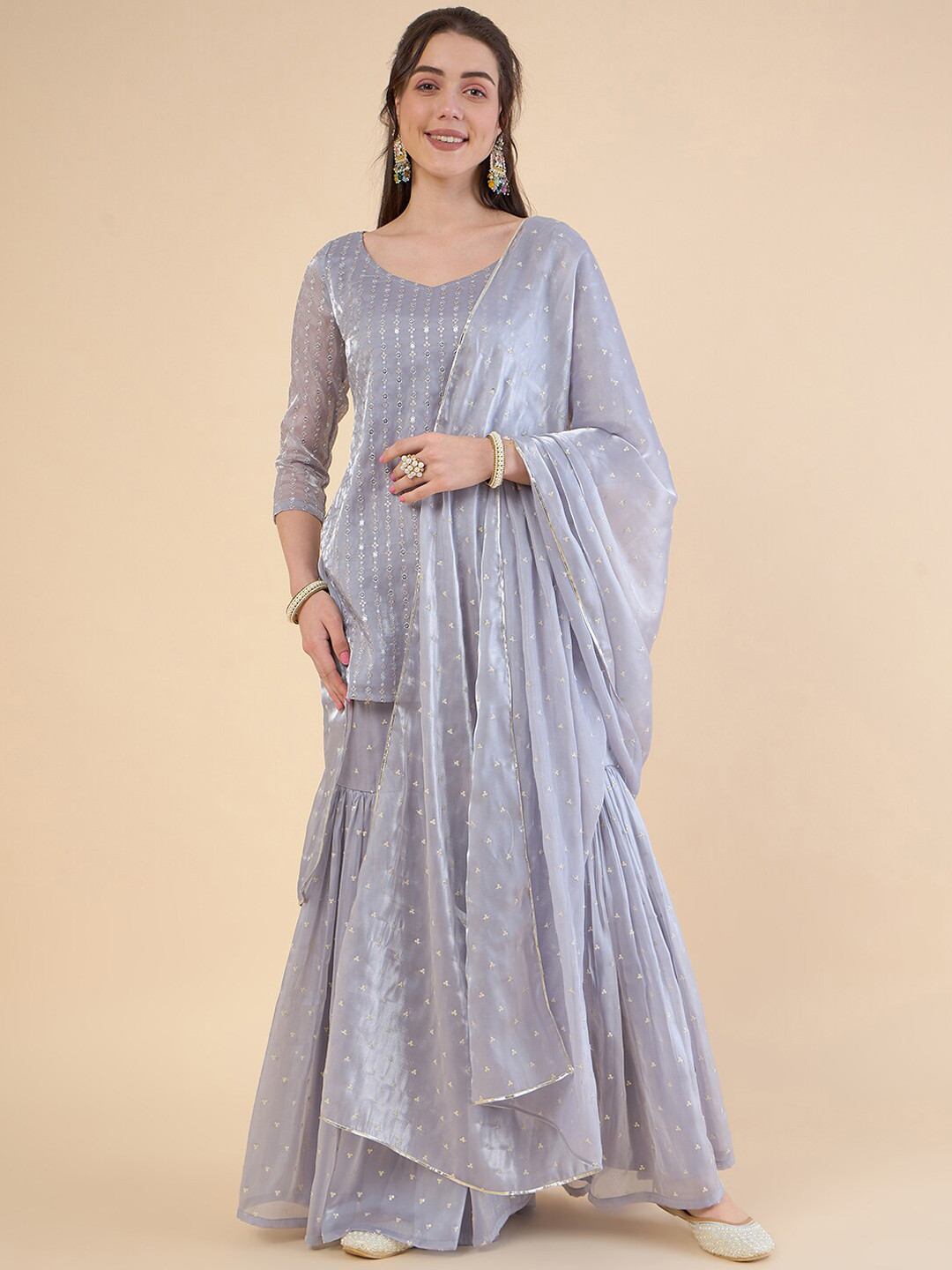 ADORNIA Embroidered Regular Sequinned Kurta with Sharara & With Dupatta, Grey melange 
ADORNIA Embroidered Regular Sequinned Kurta with Sharara & With Dupatta, Grey melange