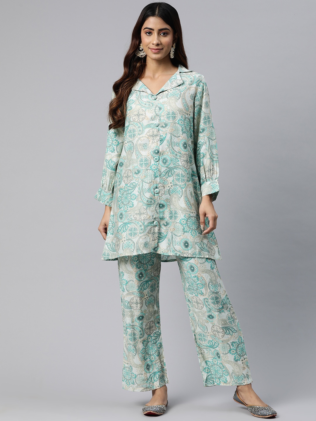 Readiprint Fashions Floral Print Sequined Pure Silk Tunic with Palazzos, Turquoise blue
Readiprint Fashions Floral Print Sequined Pure Silk Tunic with Palazzos, Turquoise blue