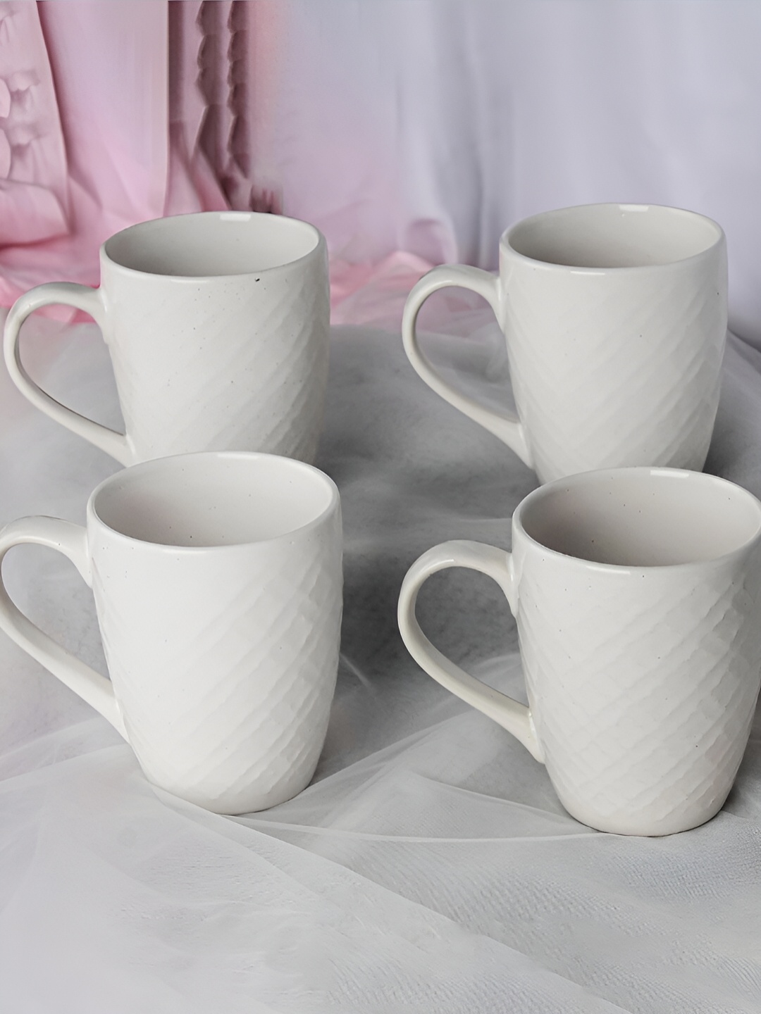 The Earth Store White 4 Pcs Textured Microwave Safe Glossy Finish Ceramic Mugs 260 ml Each
The Earth Store White 4 Pcs Textured Microwave Safe Glossy Finish Ceramic Mugs 260 ml Each