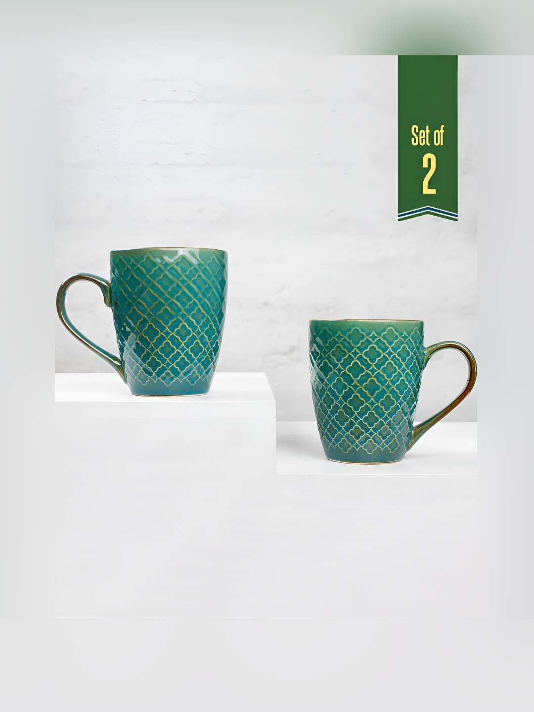 The Earth Store Teal Green 2 Pcs Textured Printed Ceramic Glossy Coffee Mugs 300 ml Each
The Earth Store Teal Green 2 Pcs Textured Printed Ceramic Glossy Coffee Mugs 300 ml Each