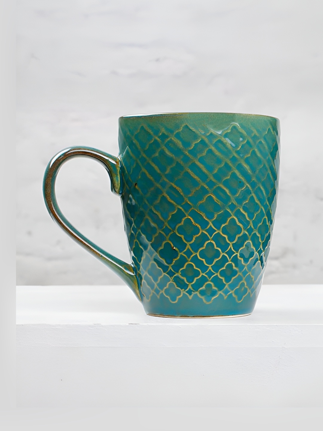 The Earth Store Green & Brown Printed Microwave Safe Glossy Finish Ceramic Mug 300 ml
The Earth Store Green & Brown Printed Microwave Safe Glossy Finish Ceramic Mug 300 ml