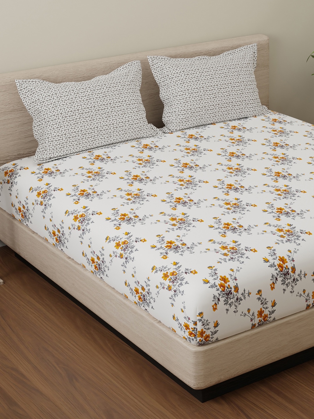 Huesland White & Grey Floral Printed Cotton 144 TC Queen Bedsheet with 2 Pillow Covers
Huesland White & Grey Floral Printed Cotton 144 TC Queen Bedsheet with 2 Pillow Covers