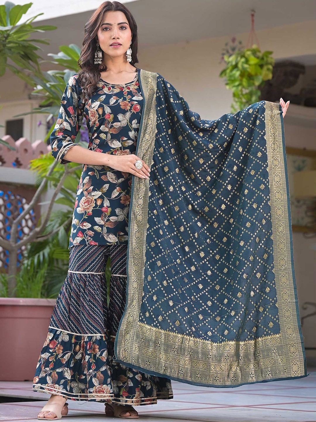 Peachmode Floral Printed Regular Beads and Stones Pure Cotton Kurta with Sharara & Dupatta, Teal
Peachmode Floral Printed Regular Beads and Stones Pure Cotton Kurta with Sharara & Dupatta, Teal