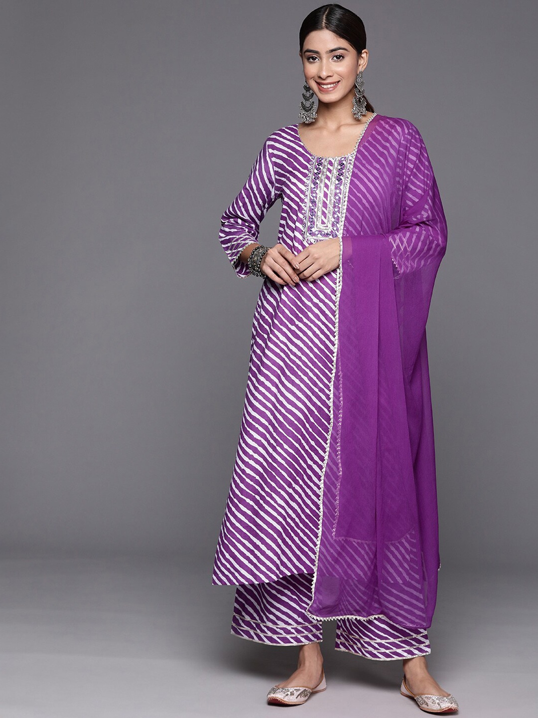 KALINI Leheriya Printed Mirror Work Pure Cotton Kurta With Trousers & Dupatta, Purple
KALINI Leheriya Printed Mirror Work Pure Cotton Kurta With Trousers & Dupatta, Purple