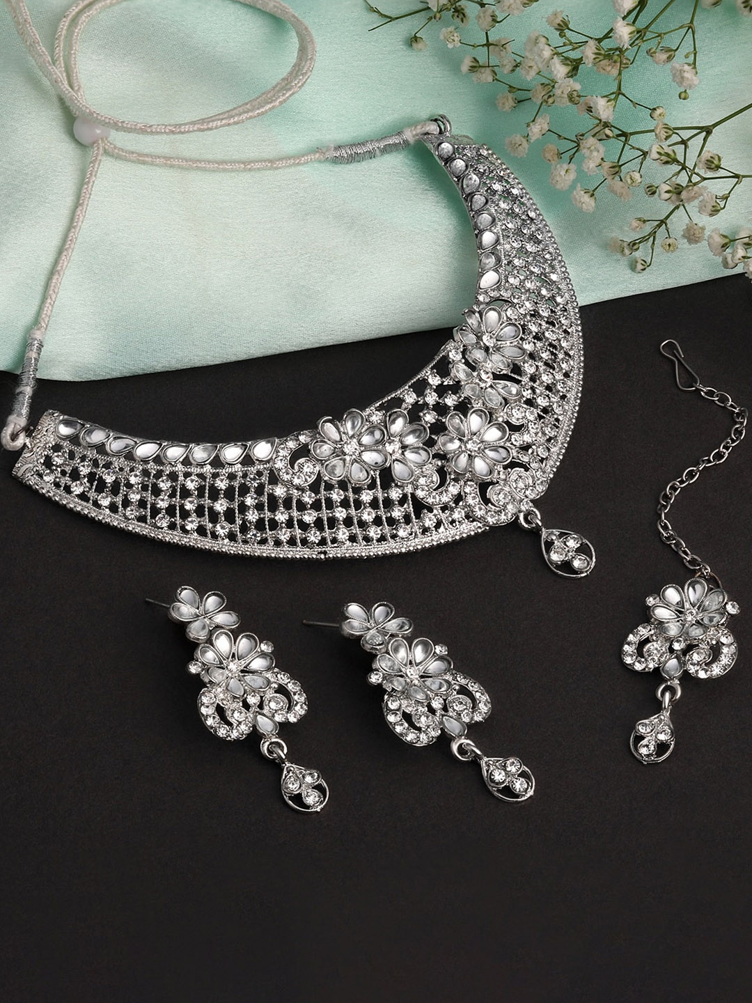 Shining Diva Silver-Plated American Diamond Studded Necklace & Earrings With Maang Tika
Shining Diva Silver-Plated American Diamond Studded Necklace & Earrings With Maang Tika