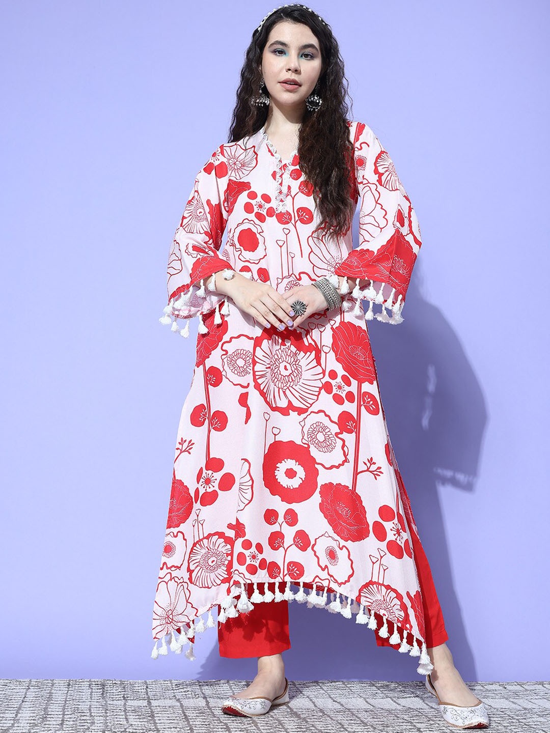 KALINI Women Floral Printed V-Neck Flared Sleeves Straight Kurta With Trousers, Peach
KALINI Women Floral Printed V-Neck Flared Sleeves Straight Kurta With Trousers, Peach