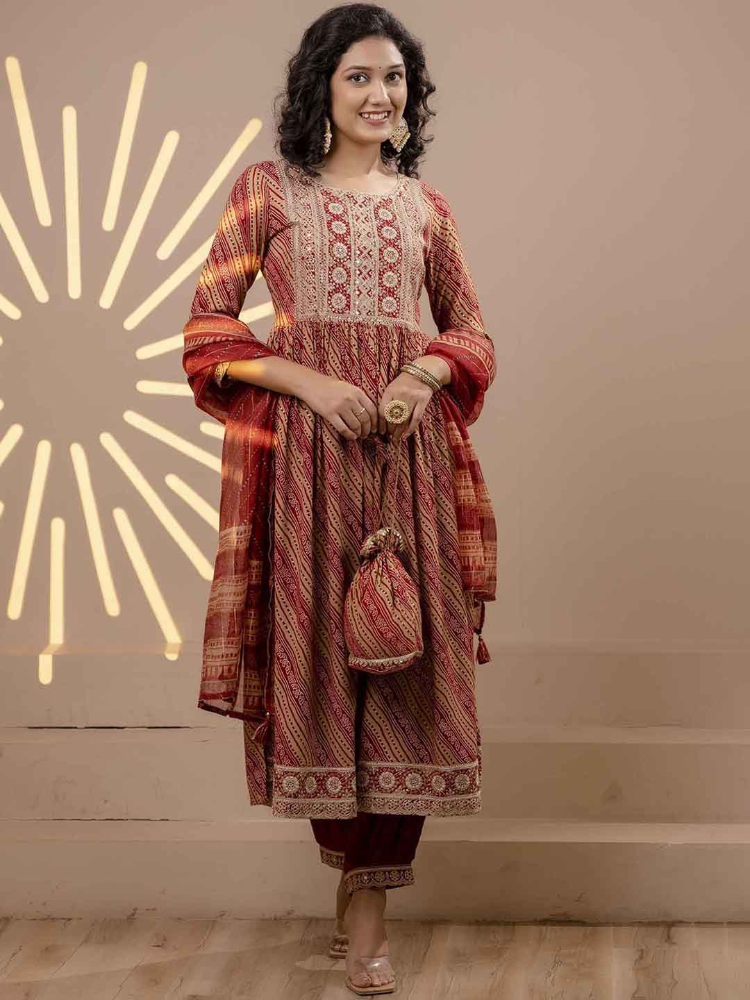 KALINI Bandhani Printed Sequined Mirror Work A-Line Kurta with Palazzos, Dupatta & Potli, Red
KALINI Bandhani Printed Sequined Mirror Work A-Line Kurta with Palazzos, Dupatta & Potli, Red