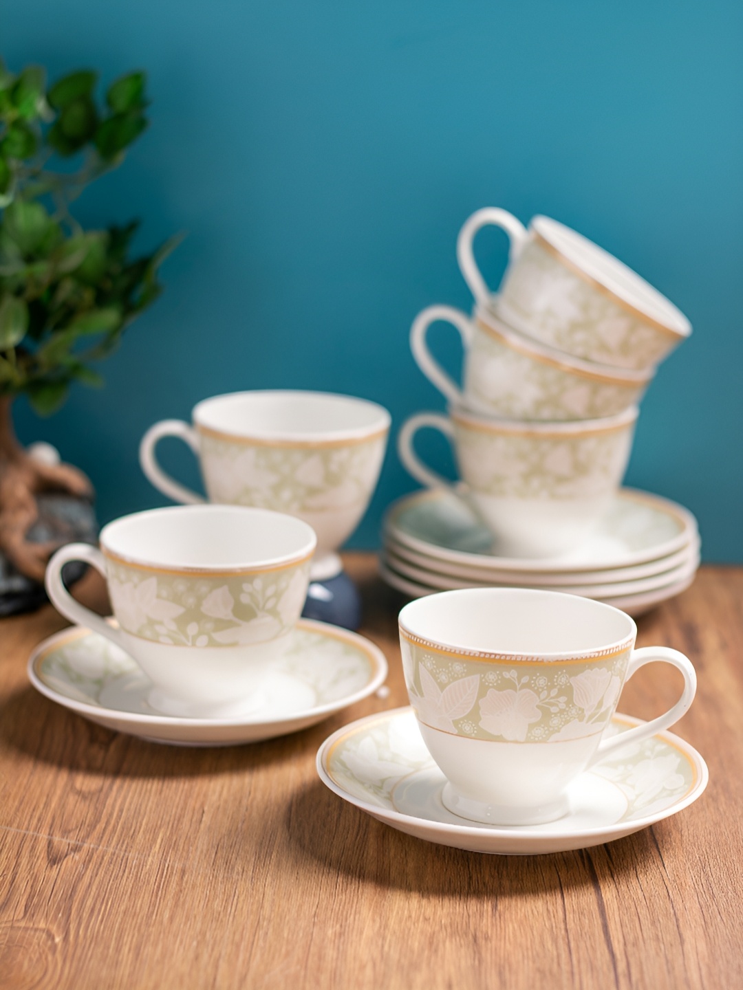 CLAY CRAFT White Green 12 Pieces Floral Printed Ceramic Glossy Cups & Saucers 180 ml Each
CLAY CRAFT White Green 12 Pieces Floral Printed Ceramic Glossy Cups & Saucers 180 ml Each