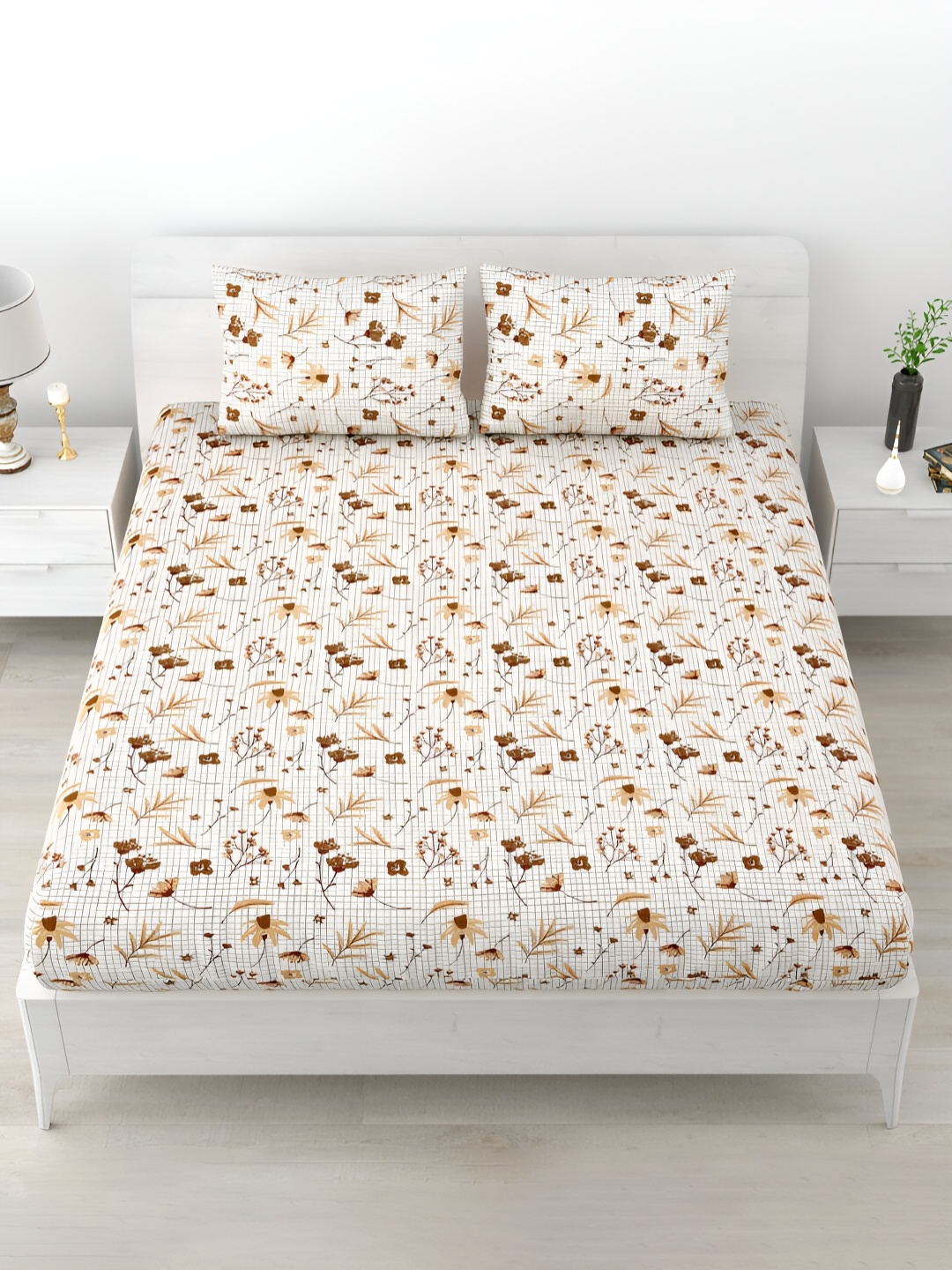 POORAK Brown & White Floral Printed 120 TC King Cotton Bedsheet with 2 Pillow Covers
POORAK Brown & White Floral Printed 120 TC King Cotton Bedsheet with 2 Pillow Covers