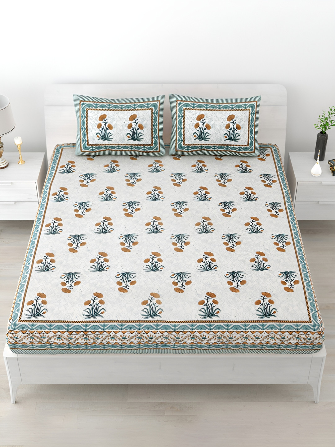POORAK Brown & White Floral Printed 120 TC King Size Cotton Bedsheet with 2 Pillow Covers
POORAK Brown & White Floral Printed 120 TC King Size Cotton Bedsheet with 2 Pillow Covers