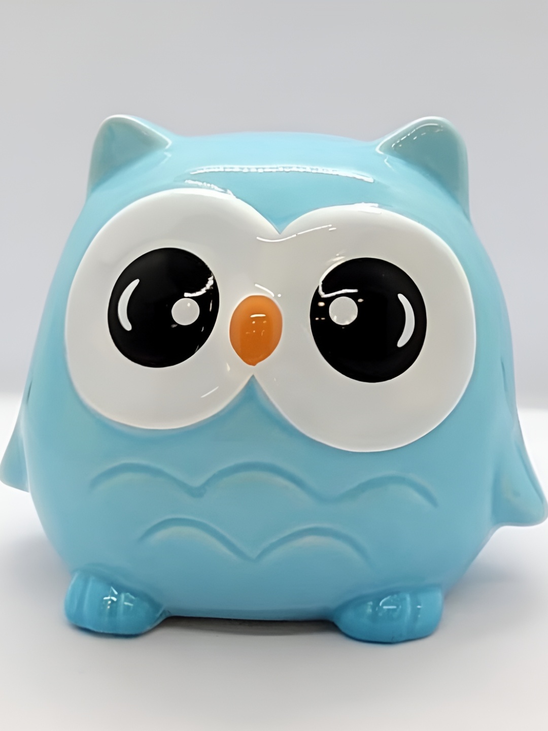 Satyam Kraft Blue & Black Ceramic Birds And Animals Owl Design Gullak with Lock Showpiece
Satyam Kraft Blue & Black Ceramic Birds And Animals Owl Design Gullak with Lock Showpiece