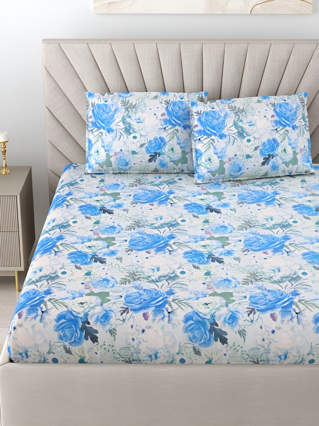 BOMBAY DYEING Blue & White Floral Printed Cotton 144 TC King Bedsheet with 2 Pillow Covers
BOMBAY DYEING Blue & White Floral Printed Cotton 144 TC King Bedsheet with 2 Pillow Covers