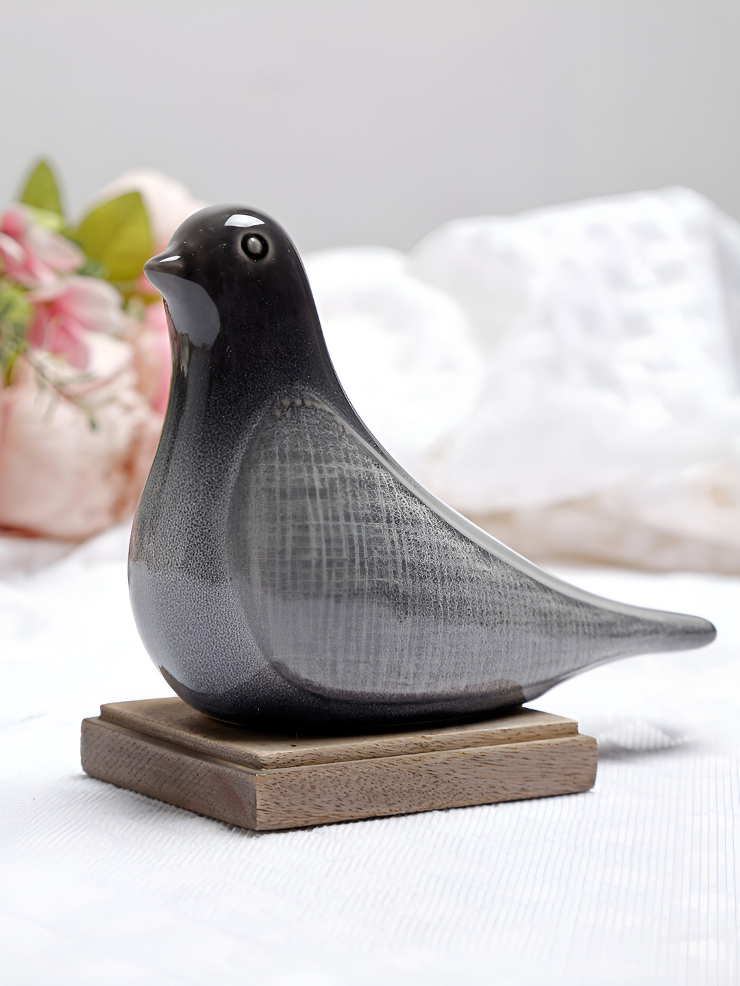 Fabindia Grey & Black Bird Figurine Ceramic Showpiece 
Fabindia Grey & Black Bird Figurine Ceramic Showpiece