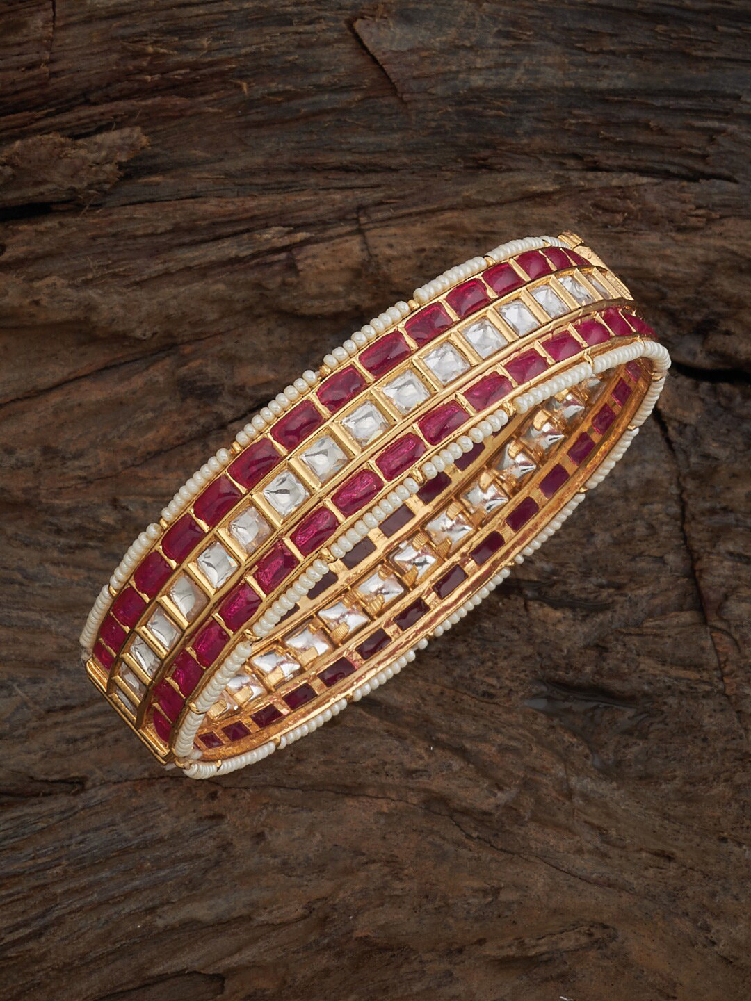 Kushal's Fashion Jewellery Gold Plated Kuddan Stone-Studded Copper Bangles
Kushal's Fashion Jewellery Gold Plated Kuddan Stone-Studded Copper Bangles