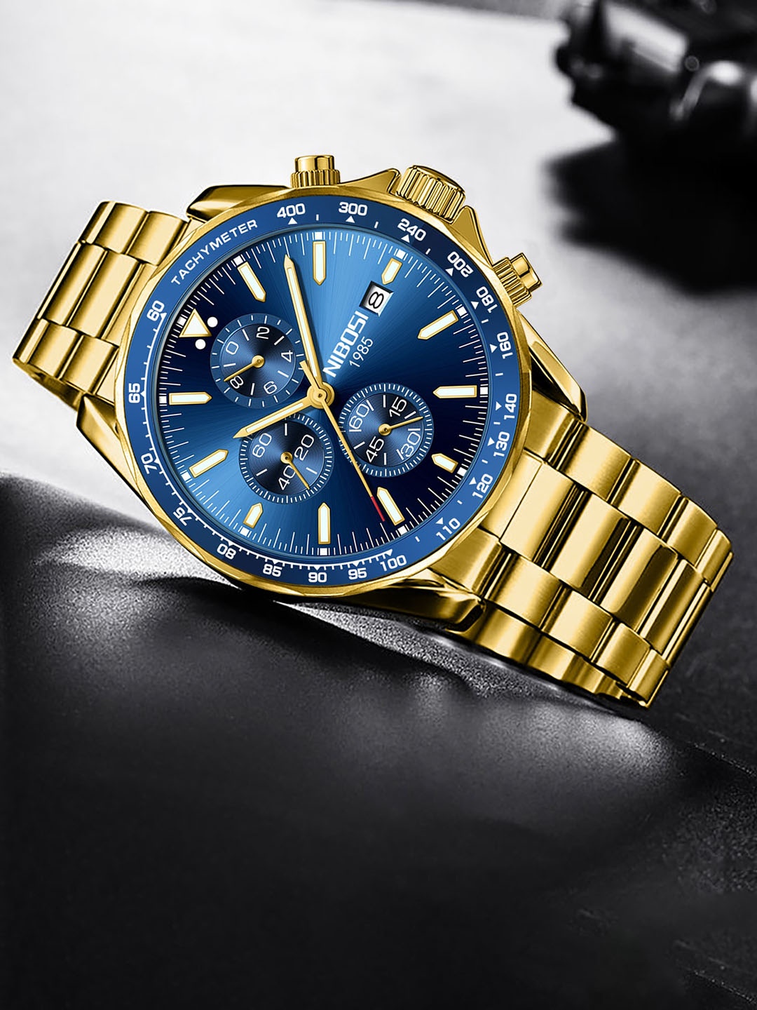 Nibosi Men Embellished Dial & Stainless Steel Straps Analogue Watch NB-2610-M-GLD-BLU, Gold
Nibosi Men Embellished Dial & Stainless Steel Straps Analogue Watch NB-2610-M-GLD-BLU, Gold