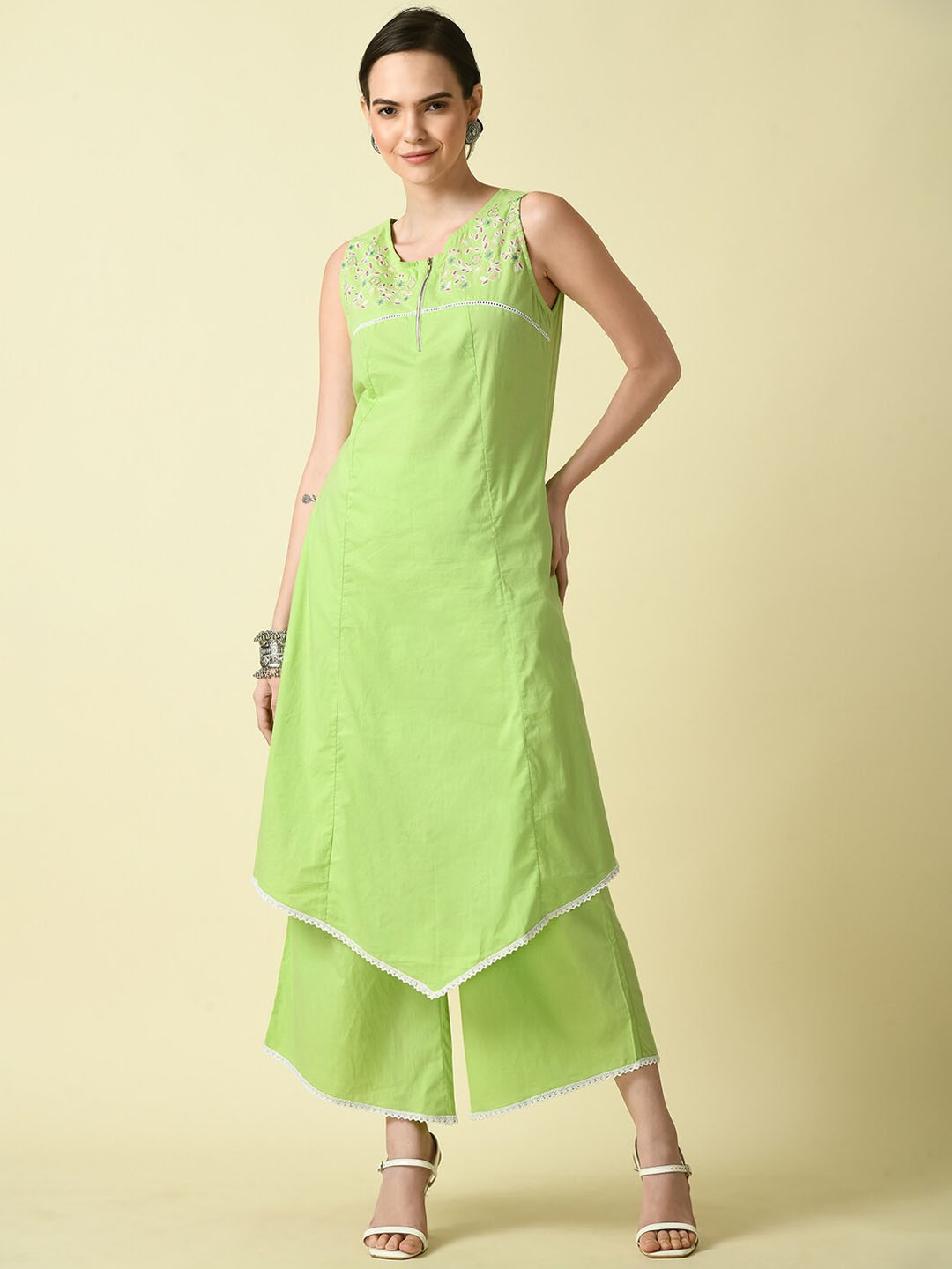 KALINI Floral Yoke Design Thread Work Asymmetric A-Line Pure Cotton Kurta with Palazzos, Green
KALINI Floral Yoke Design Thread Work Asymmetric A-Line Pure Cotton Kurta with Palazzos, Green