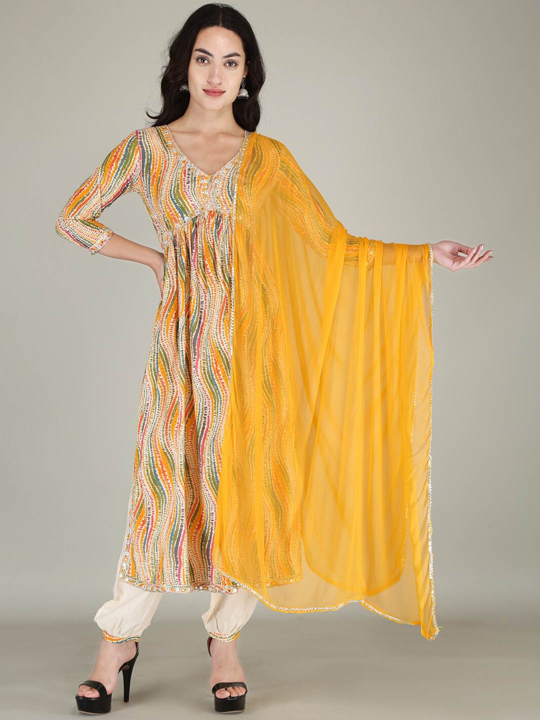 PARTHVI Ethnic Motifs Embroidered Regular Mirror Work Kurta with Salwar & Dupatta, Yellow
PARTHVI Ethnic Motifs Embroidered Regular Mirror Work Kurta with Salwar & Dupatta, Yellow