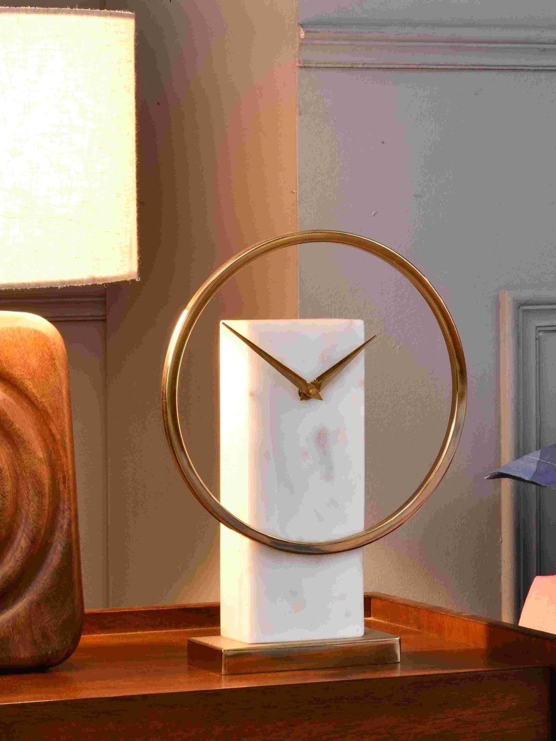 Athome by Nilkamal Beige & White Contemporary Round Dial Metal and Stone Table Clock
Athome by Nilkamal Beige & White Contemporary Round Dial Metal and Stone Table Clock
