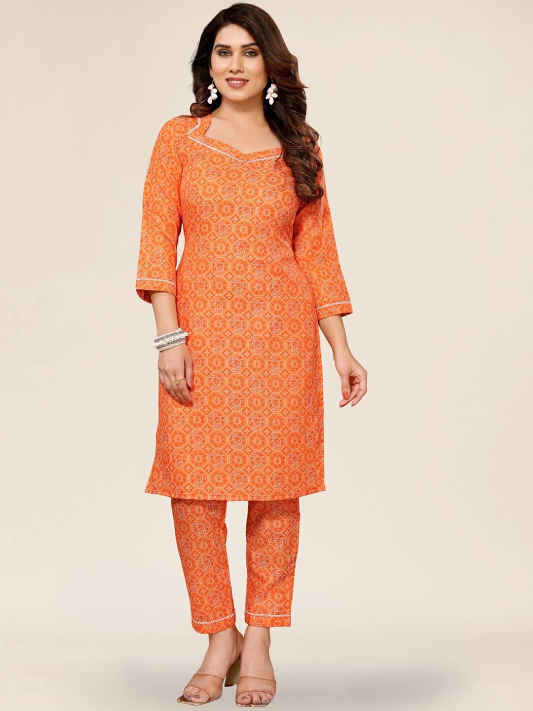 TITANIUM SILK INDUSTRIES PVT. LTD. Women Ethnic Motifs Printed Regular Kurta with Trousers, Orange
TITANIUM SILK INDUSTRIES PVT. LTD. Women Ethnic Motifs Printed Regular Kurta with Trousers, Orange
