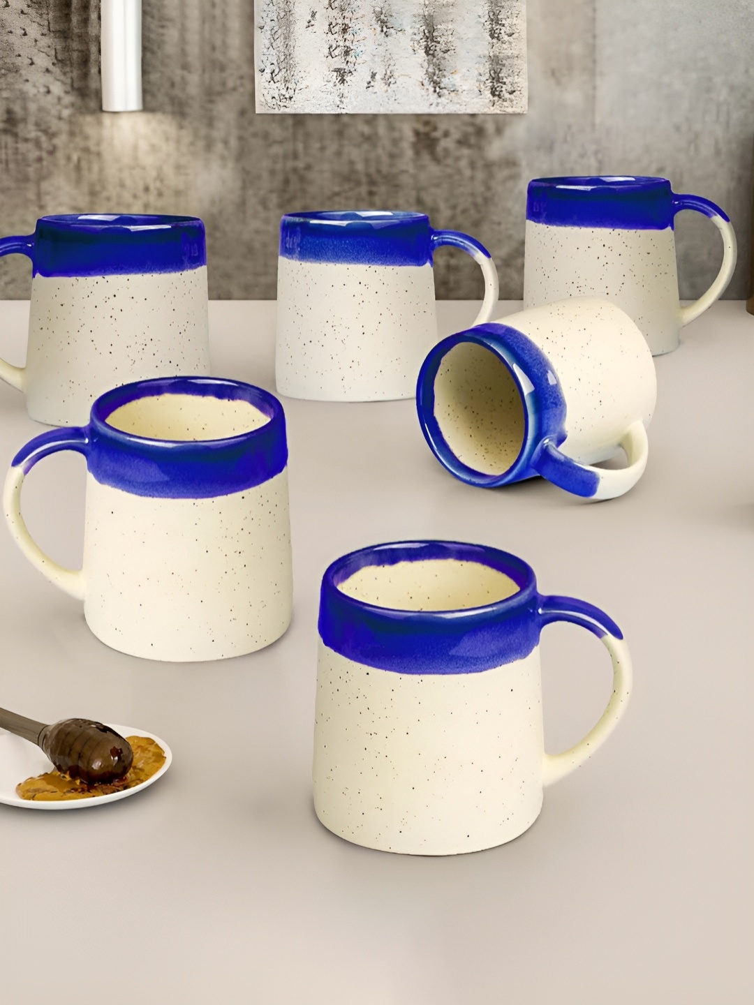 The Earth Store Blue & Cream-Coloured Handcrafted Printed Ceramic Glossy Mugs Set of Cups and Mugs
The Earth Store Blue & Cream-Coloured Handcrafted Printed Ceramic Glossy Mugs Set of Cups and Mugs