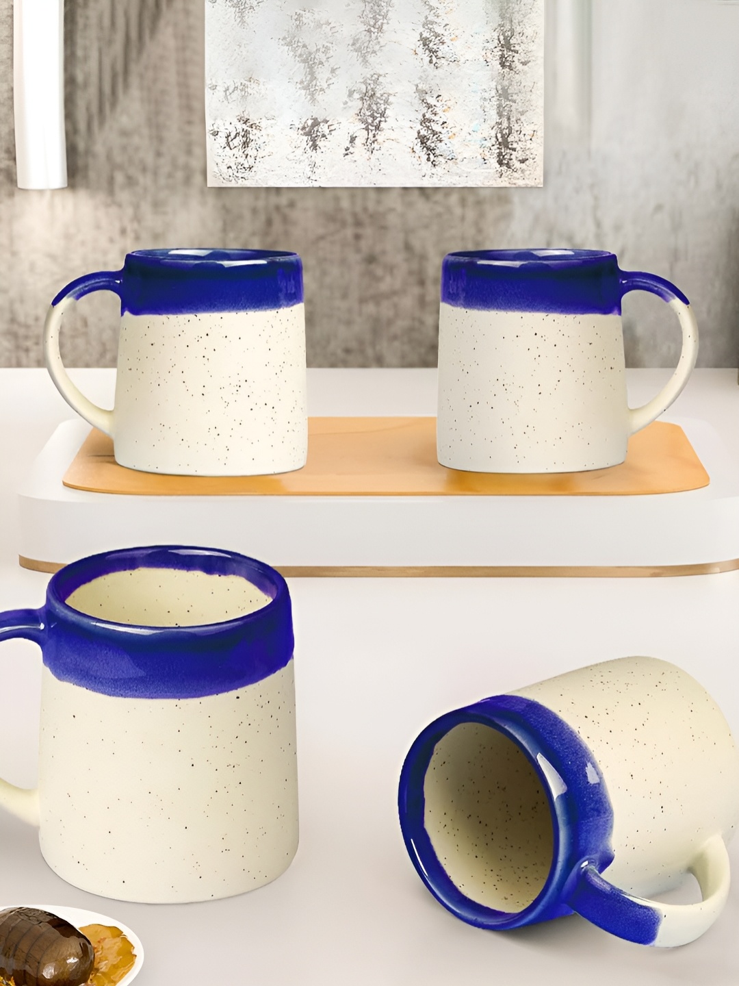 The Earth Store Blue & Cream-Coloured Handcrafted Printed Ceramic Glossy Mugs Set of Cups and Mugs
The Earth Store Blue & Cream-Coloured Handcrafted Printed Ceramic Glossy Mugs Set of Cups and Mugs