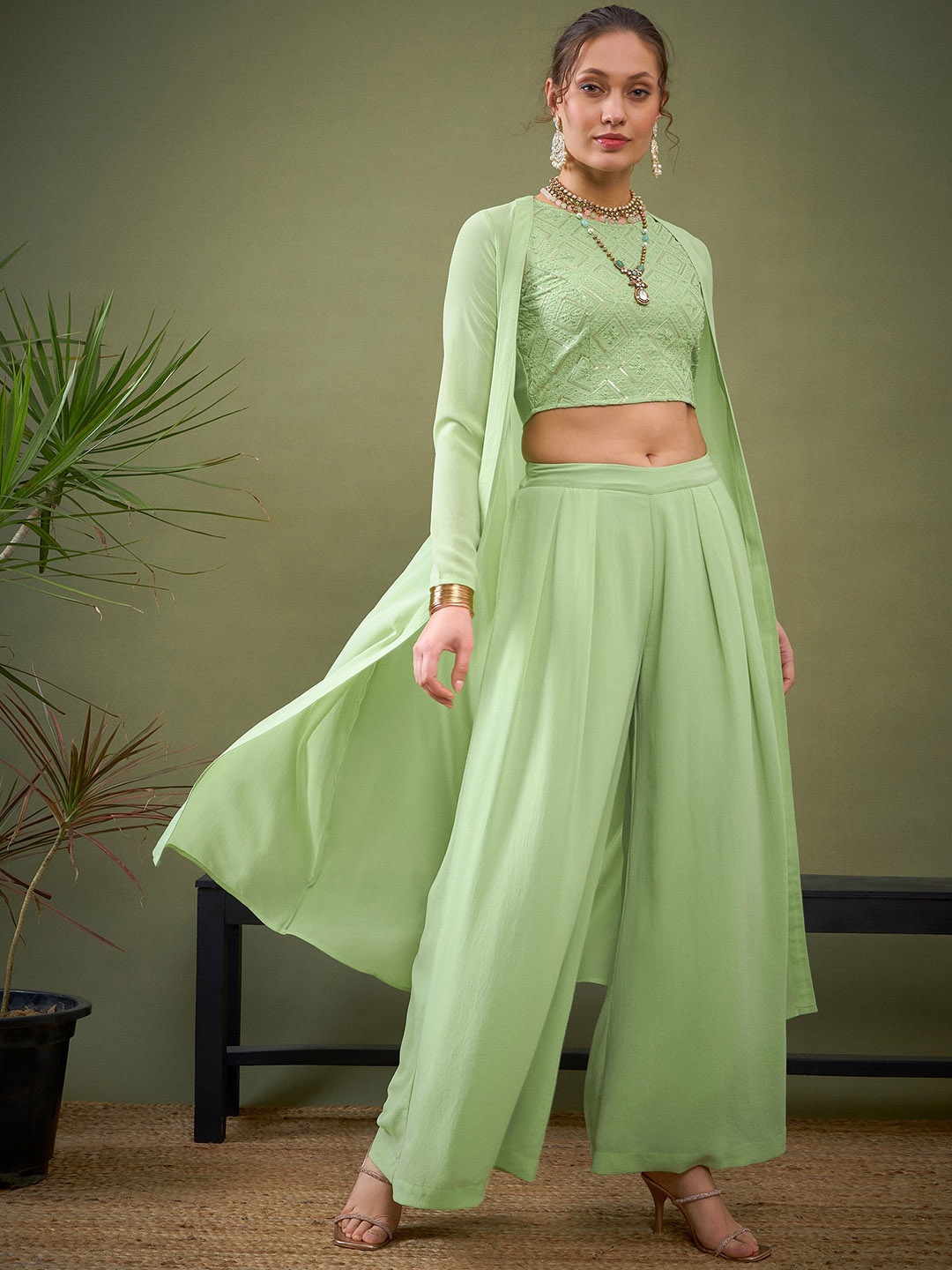 Shae by SASSAFRAS Green Embroidered Round Neck Crop Top & Flared Palazzo & Shrug Co-Ords
Shae by SASSAFRAS Green Embroidered Round Neck Crop Top & Flared Palazzo & Shrug Co-Ords