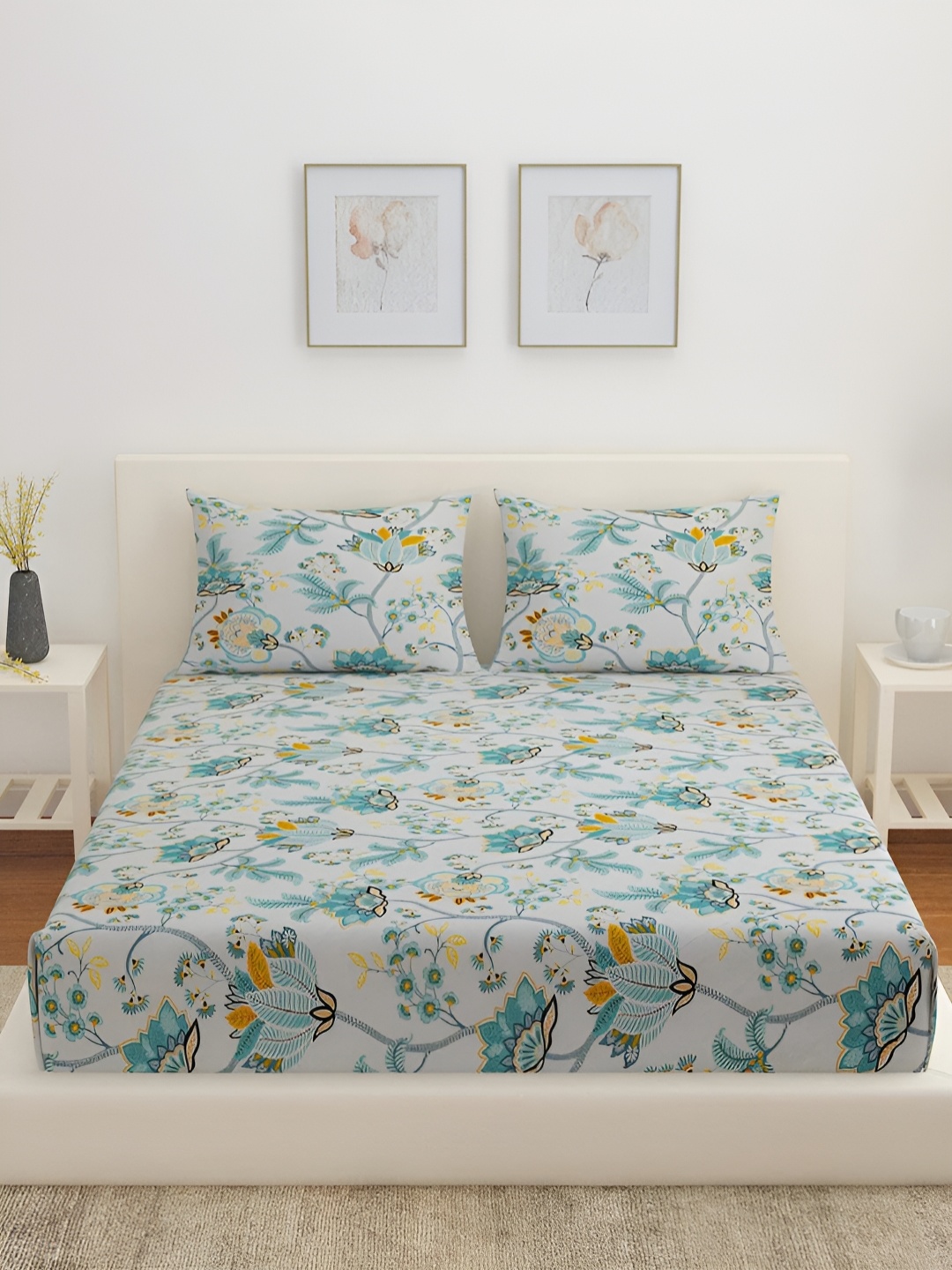 Athome by Nilkamal Blue & Beige Floral 160 TC Cotton Queen Bedsheet With 2 Pillow Covers
Athome by Nilkamal Blue & Beige Floral 160 TC Cotton Queen Bedsheet With 2 Pillow Covers