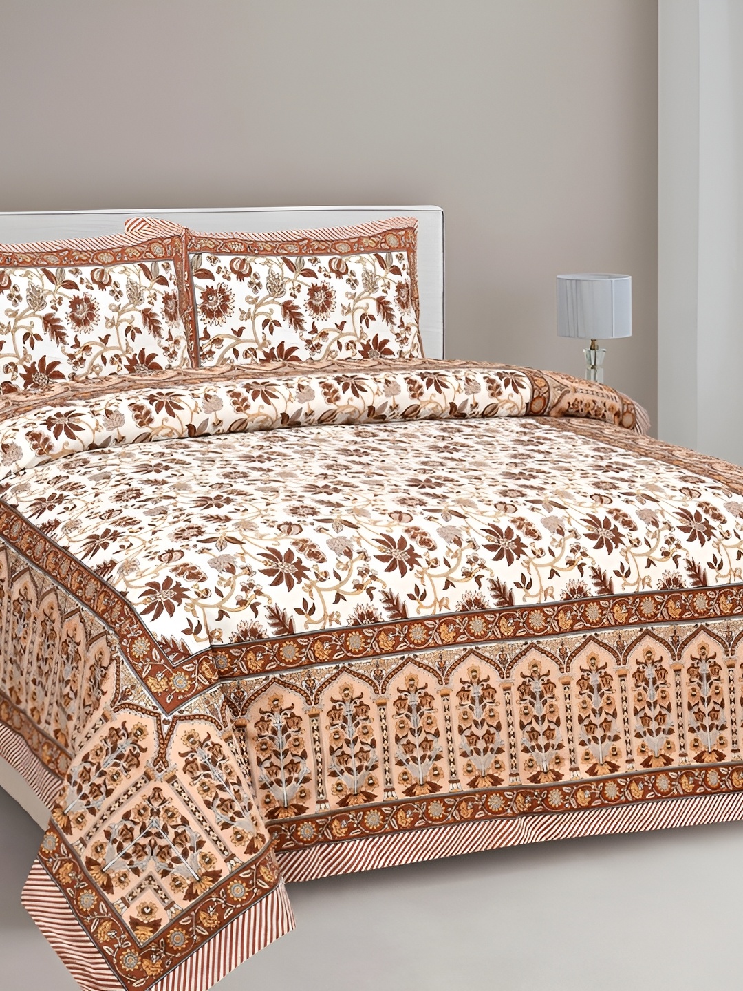 CLOTHOLOGY Beige & White Floral Printed Cotton 180 TC King Bedsheet With 2 Pillow Covers
CLOTHOLOGY Beige & White Floral Printed Cotton 180 TC King Bedsheet With 2 Pillow Covers