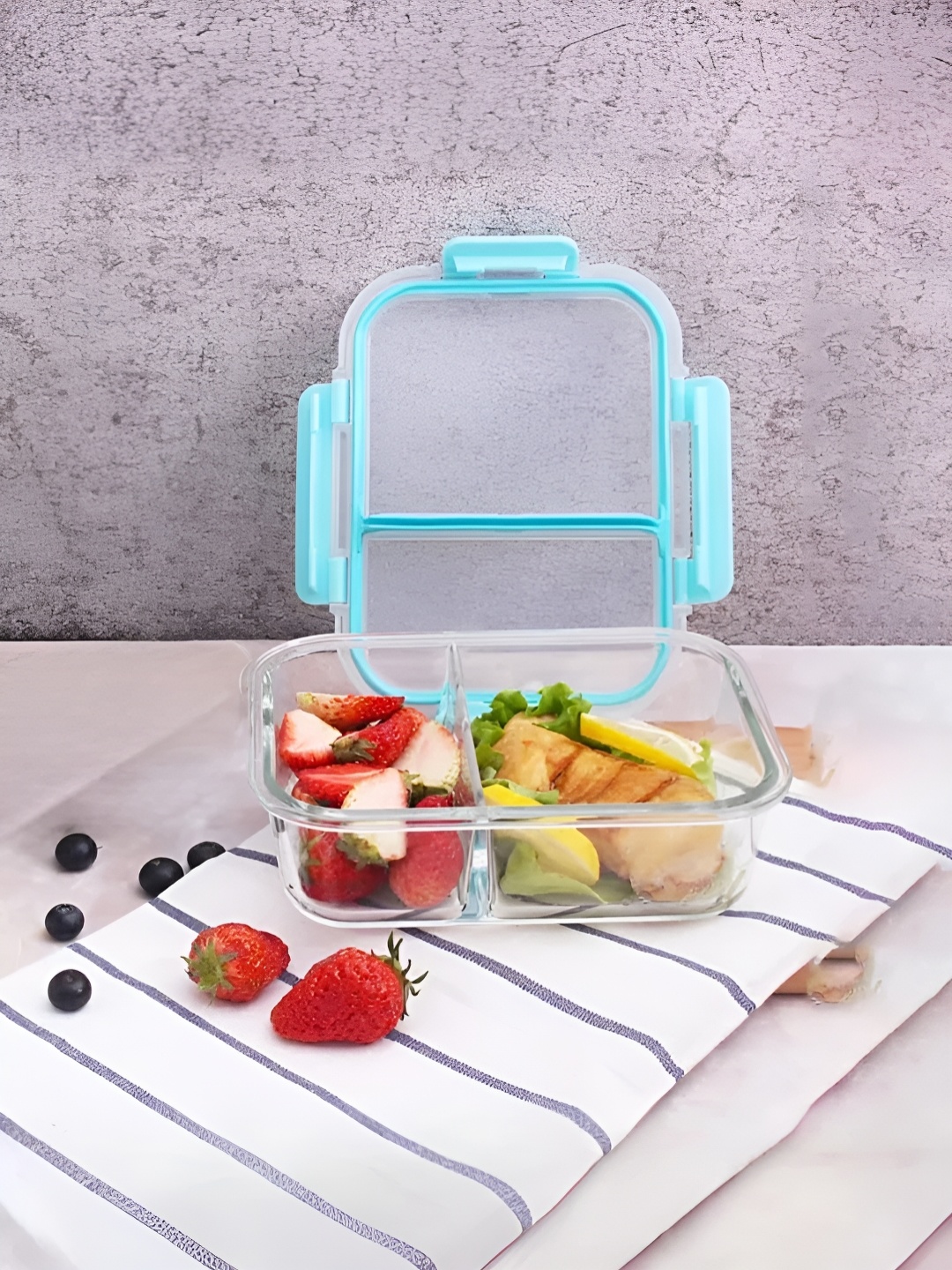 The Better Home Transparent & Blue Glass Microwave Safe Two Compartment Lunch Box Set
The Better Home Transparent & Blue Glass Microwave Safe Two Compartment Lunch Box Set