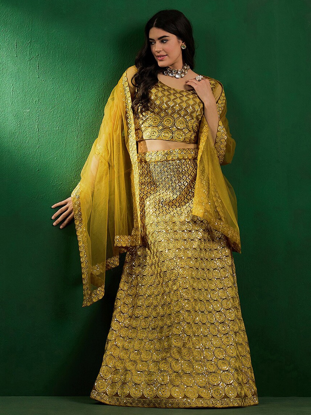 Sangria Ethnic Motifs Embroidered Sequinned Net Semi-Stitched Lehenga Choli, Mustard
Sangria Ethnic Motifs Embroidered Sequinned Net Semi-Stitched Lehenga Choli, Mustard