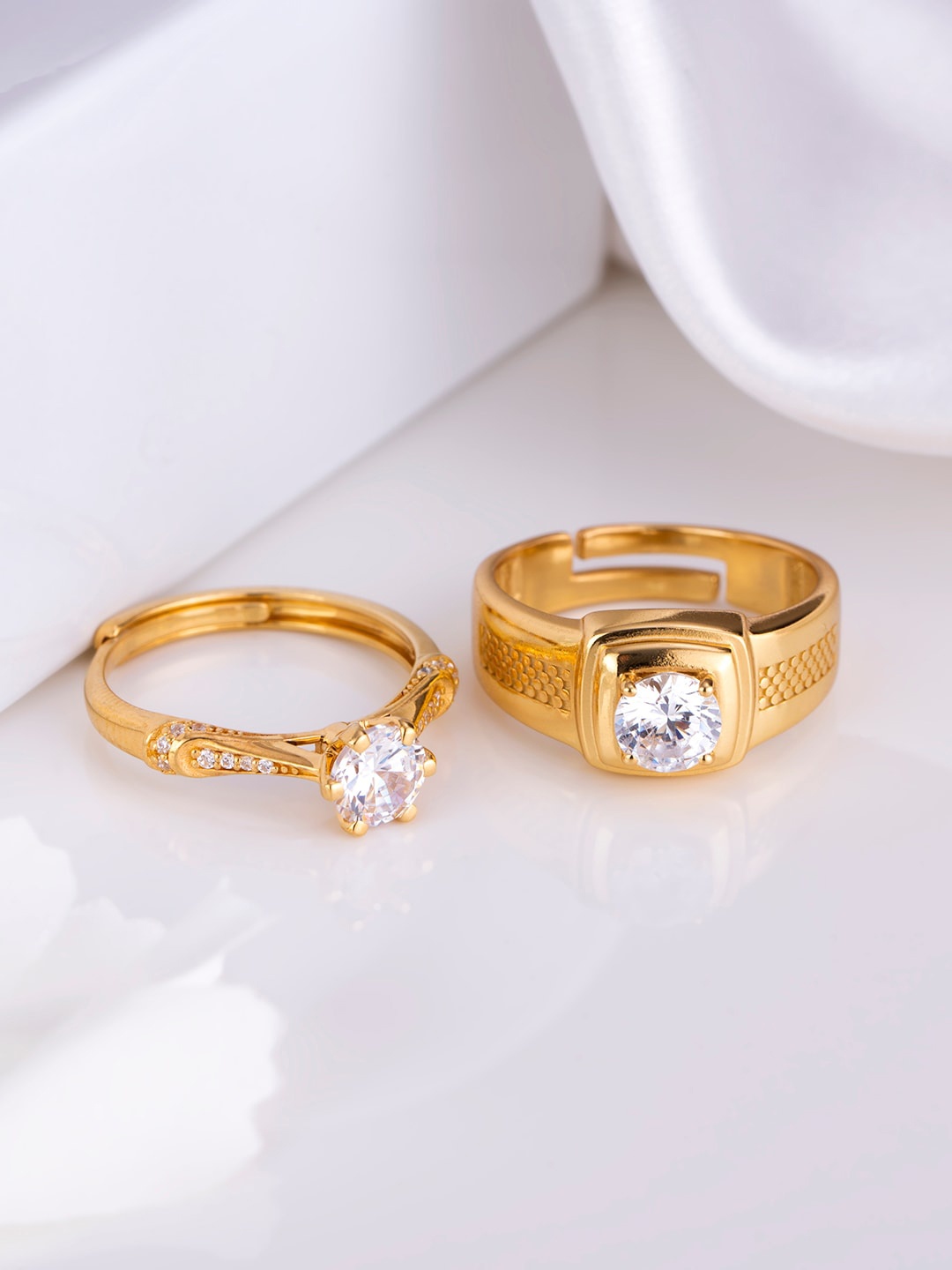 Zavya Set Of 2 Gold-Plated 925 Pure Sterling Silver Cubic Zirconia Studded Finger Ring
Zavya Set Of 2 Gold-Plated 925 Pure Sterling Silver Cubic Zirconia Studded Finger Ring