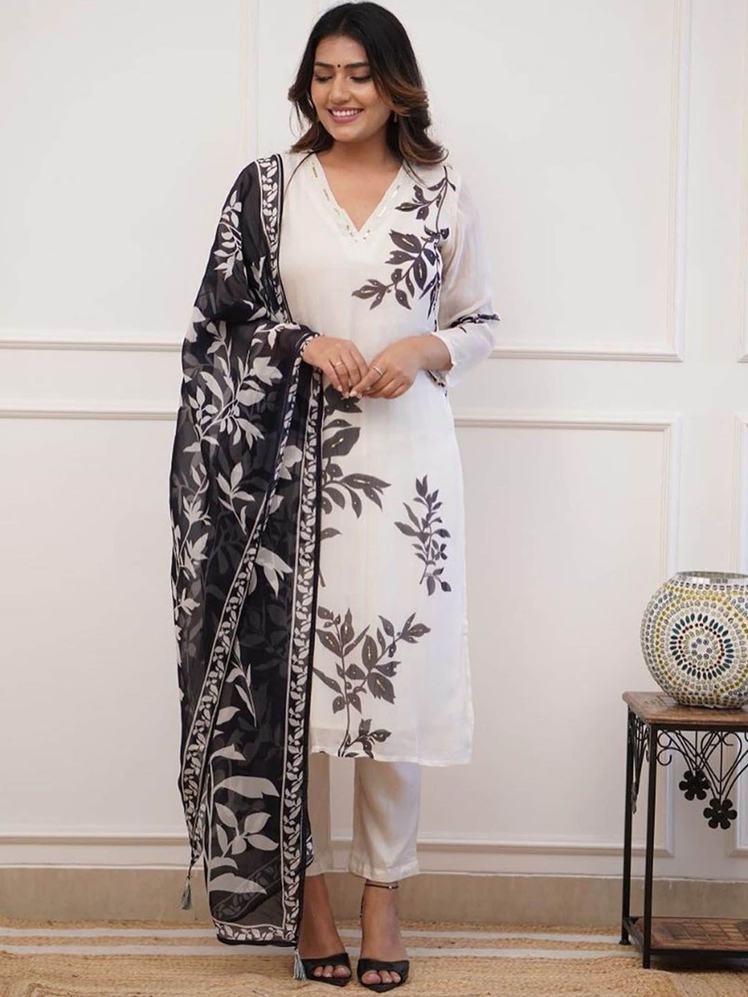 NIZA FASHION Floral Printed Regular Thread Work Kurta with Trousers & With Dupatta, White
NIZA FASHION Floral Printed Regular Thread Work Kurta with Trousers & With Dupatta, White