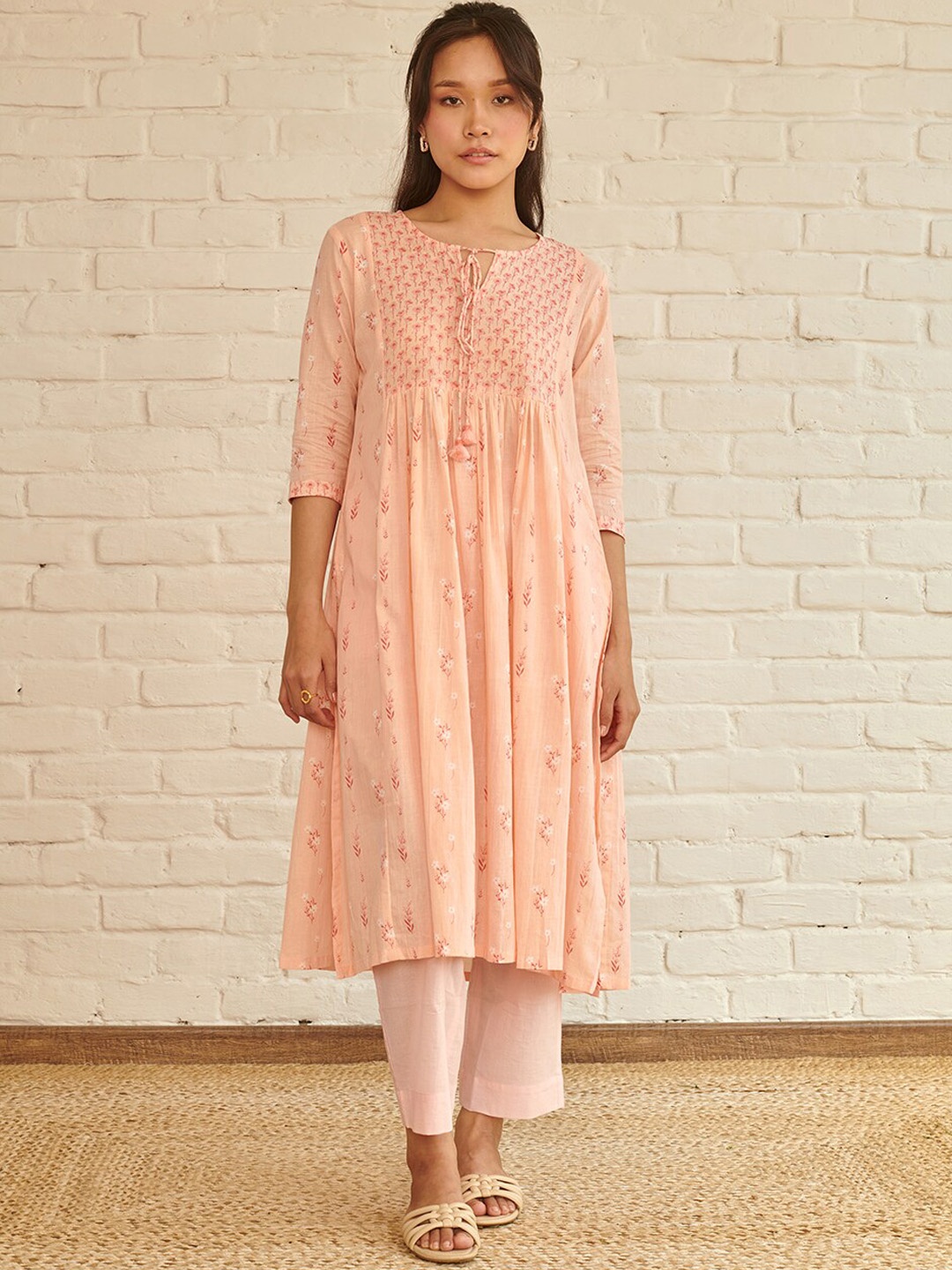 Prakriti Jaipur Women Floral Printed Tie-Up Neck Pleated A-Line Kurta With Trouser, Peach
Prakriti Jaipur Women Floral Printed Tie-Up Neck Pleated A-Line Kurta With Trouser, Peach