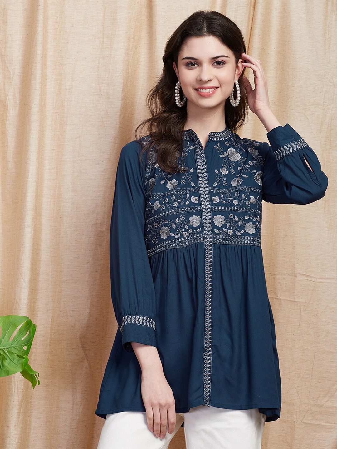 FASHOR Blue Ethnic Motifs Embroidered Cuffed Sleeves Thread Work Pleated A-line Kurti
FASHOR Blue Ethnic Motifs Embroidered Cuffed Sleeves Thread Work Pleated A-line Kurti