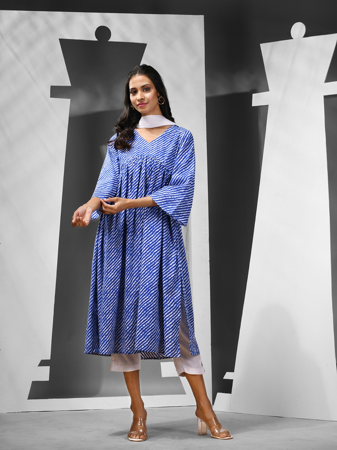 Charukriti Women Leheriya Striped Empire Pure Cotton Kurta with Trousers & With Dupatta, Blue
Charukriti Women Leheriya Striped Empire Pure Cotton Kurta with Trousers & With Dupatta, Blue