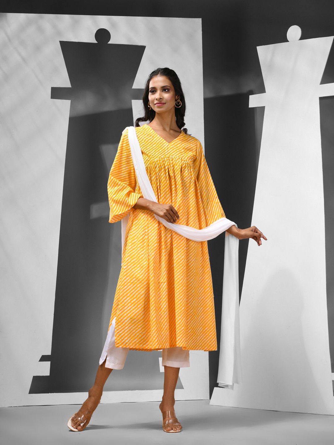 Charukriti Women Leheriya Printed Regular Pure Cotton Kurta with Trousers & With Dupatta, Yellow
Charukriti Women Leheriya Printed Regular Pure Cotton Kurta with Trousers & With Dupatta, Yellow