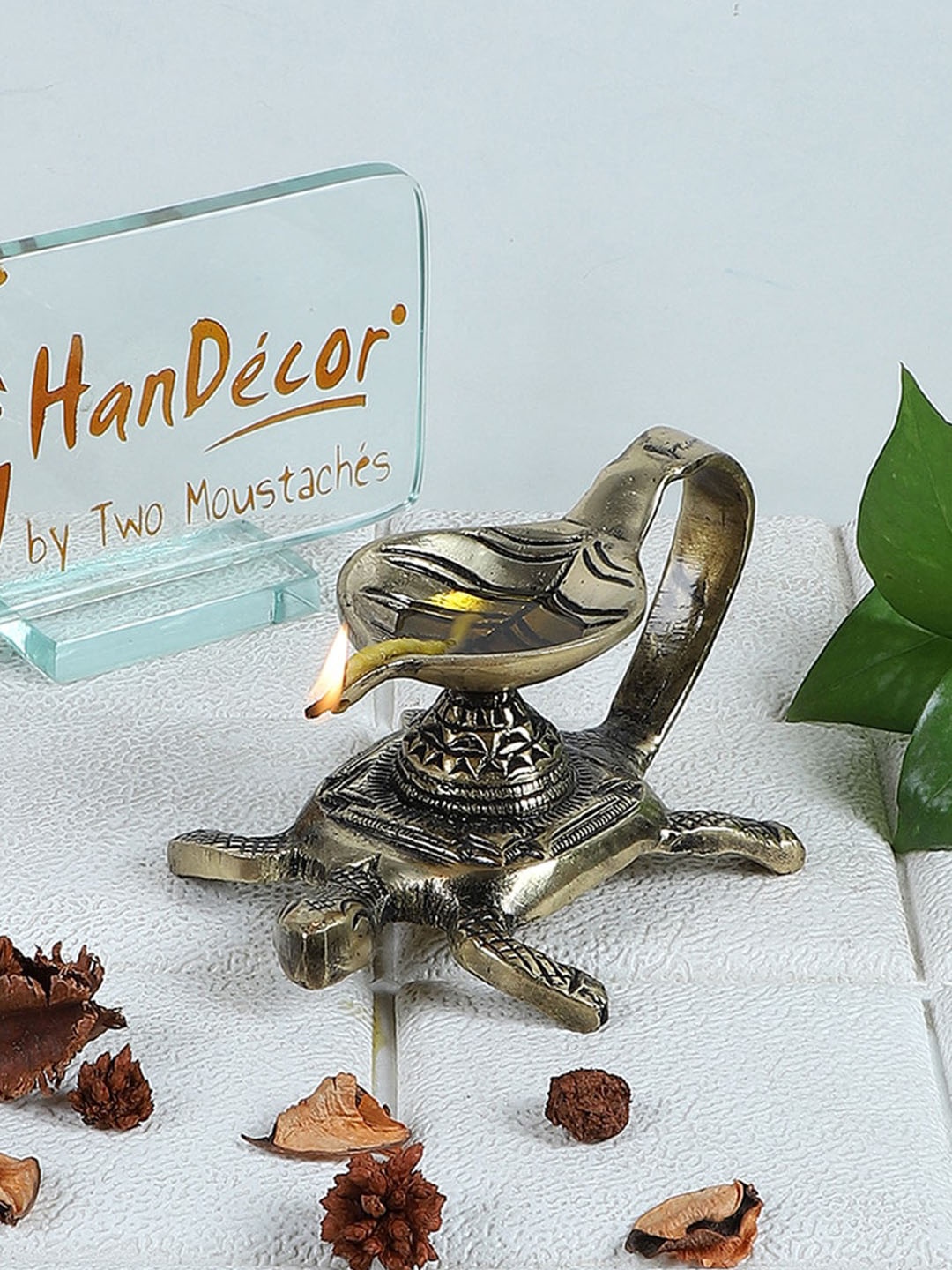 Two Moustaches Gold Toned Turtle Leaf Vilakku Brass Diya