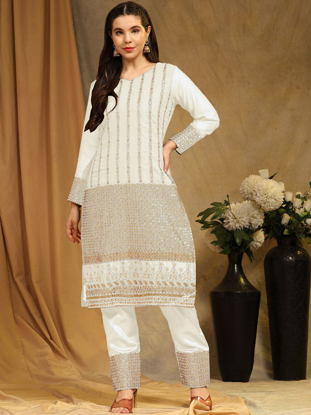 ODETTE Ethnic Motifs Embroidered V-Neck Sequinned Georgette Kurta With Trouser & Dupatta, Off white
ODETTE Ethnic Motifs Embroidered V-Neck Sequinned Georgette Kurta With Trouser & Dupatta, Off white