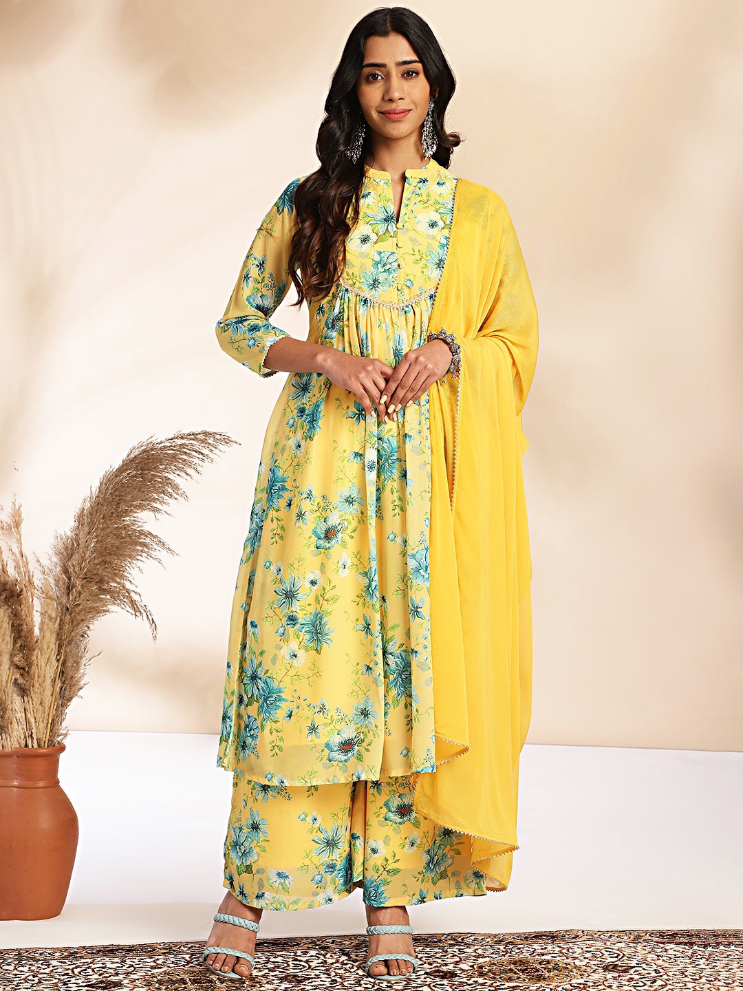 KALINI Floral Printed Mandarin Collar Empire Gotta Patti Kurta With Palazzos & Dupatta, Yellow
KALINI Floral Printed Mandarin Collar Empire Gotta Patti Kurta With Palazzos & Dupatta, Yellow