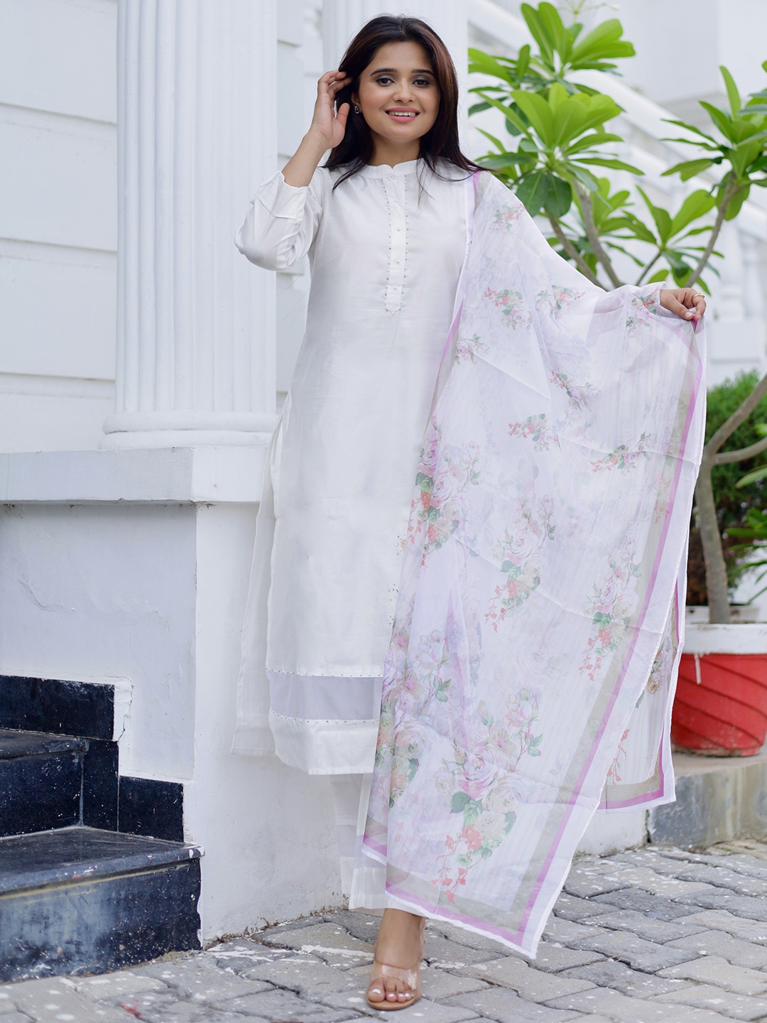 Libas Floral Printed Regular Beads and Stones Kurta with Trousers & Dupatta, Off white
Libas Floral Printed Regular Beads and Stones Kurta with Trousers & Dupatta, Off white