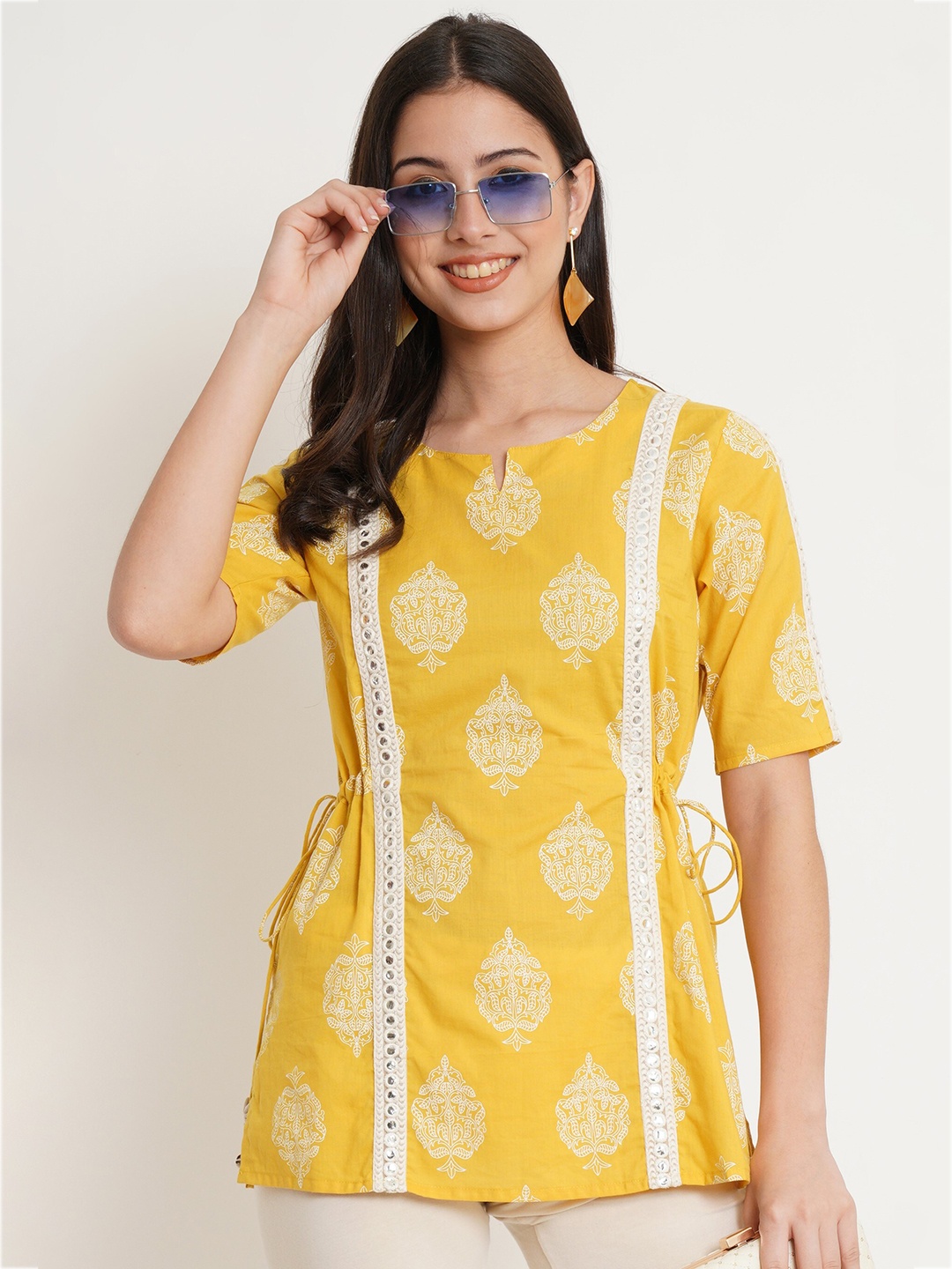 KALINI Ethnic Motifs Print Cotton Notched Neck Short Sleeves Opaque Casual Top, Yellow
KALINI Ethnic Motifs Print Cotton Notched Neck Short Sleeves Opaque Casual Top, Yellow